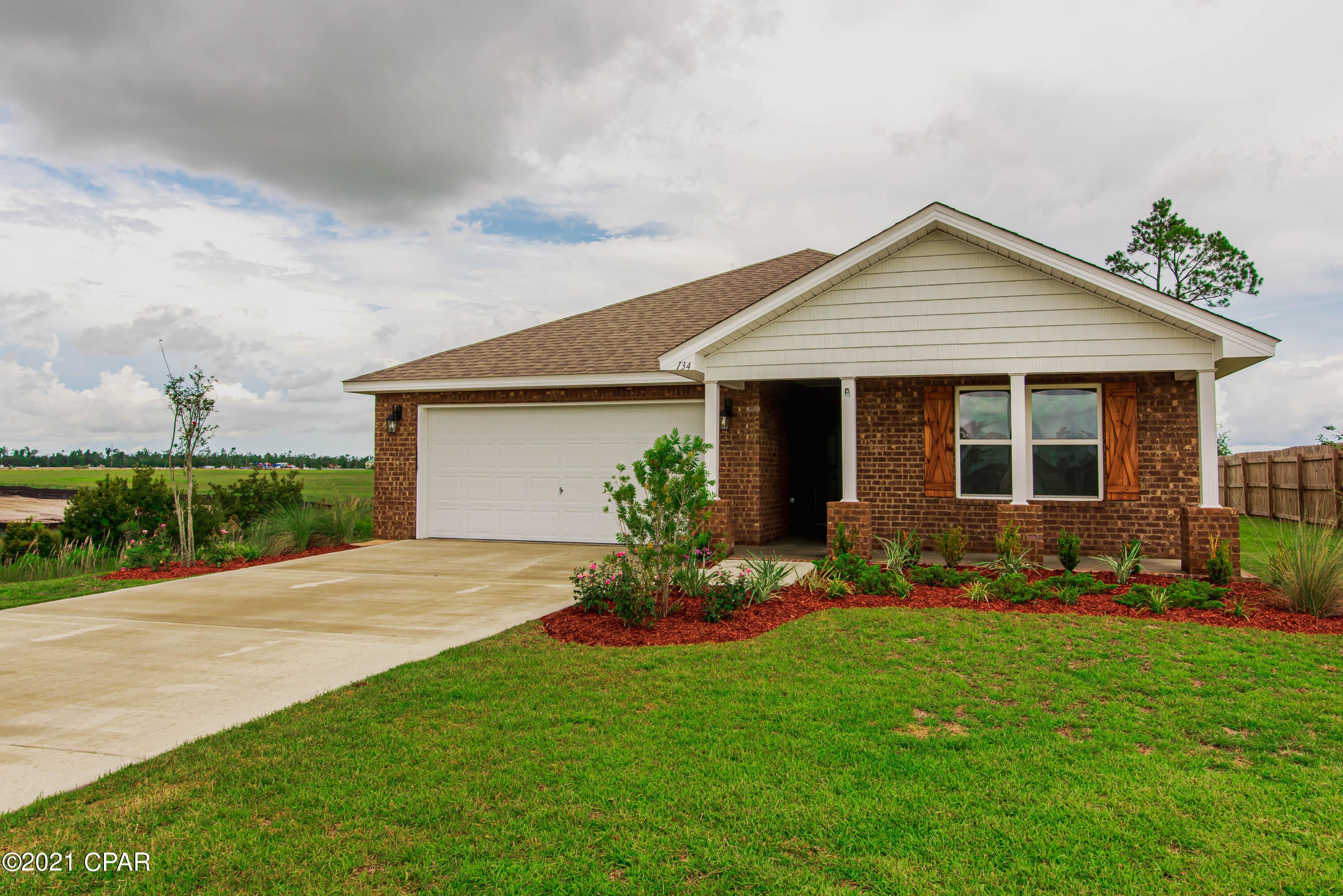 *CURRENTLY UNDER CONTRACT SELLER ACCEPTING BACKUP OFFERS* This Ryder Plan brick home is one of a kind currently for sale in Hodges Bayou Plantation! This is your chance to experience country living in a gated waterfront community where you can catch gorgeous sunsets over the bayou!  Hodges Bayou is located just off Highway 231 and Highway 2321. Conveniently located to Lynn Haven and only 18 miles to Tyndall AFB.  





As you drive up to this home you will a see a covered porch and two car garage. This home offers an open floor plan with a hallway that opens to the large great room, kitchen and dining area. The kitchen is open with a center island and has beautifully stained cabinetry and a spacious pantry for storage. Appliances include a dishwasher, microwave, stove and refrigerator In the master suite you will find his and hers walk in closets.  Freshly painted interior and new carpet in all bedrooms.  Contact your favorite realtor to see this home today - this one won't last long!