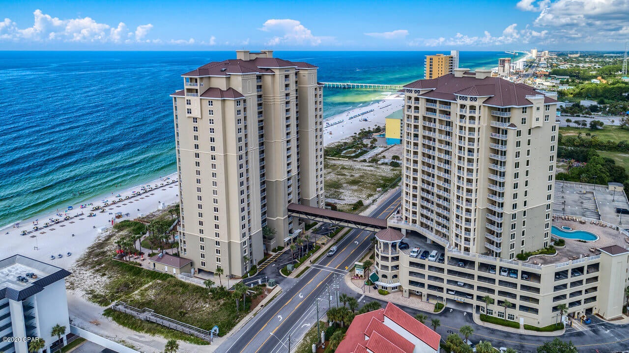 CURRENTLY UNDER CONTRACT, SELLER ACCEPTING BACKUP OFFERS. This beautiful 1 bedroom / 2 bath Gulf, sunrise, and strip view condo, is turn-key, rental ready and is located in Grand Panama Tower II - The Grand Vista. Nine foot ceilings, and a great room with lovely Gulf views. Large open kitchen with stainless appliances, granite counters, and an island breakfast bar. Accommodates 6 with a King bed, hall bunks and a Queen sleeper sofa. The owners suite features a King bed, en-suite bath with a double bowl vanity with granite top, and large walk-in shower. A full second bath with tub/shower combo for your guests. The oversized terrace has breathtaking views of the Gulf of Mexico during the day, and the city strip lights at night. Grand Panama is one of the premier luxury resorts in PCB with 650' of beachfront, and top tier family amenities such as a Gulf front heated pool and 2 hot tubs, a heated rooftop pool and hot tub, Tiki Bar, BBQ picnic areas, fitness center, a conference room, 24 hour security, and garage parking. This would make a wonderful second home for new family memories and traditions, or an excellent rental property. Short term rentals are permitted. Owners may have pets. Perfect location near Pier Park, Gulf World, the county pier, family amusements, water parks, golf, restaurants, shopping, and marinas. 

Looking for a rental investment?  This condo has excellent potential and is already fully booked thru August as well as from December 1st- March 5th. New dishwasher and microwave.

INFORMATION CONTAINED HEREIN IS DEEMED RELIABLE, BUT NOT GUARANTEED AND SHOULD BE VERIFIED BY BUYER. SUBJECT TO ERRORS, OMISSIONS, PRIOR SALE, CHANGES OR WITHDRAWALS WITHOUT NOTICE.