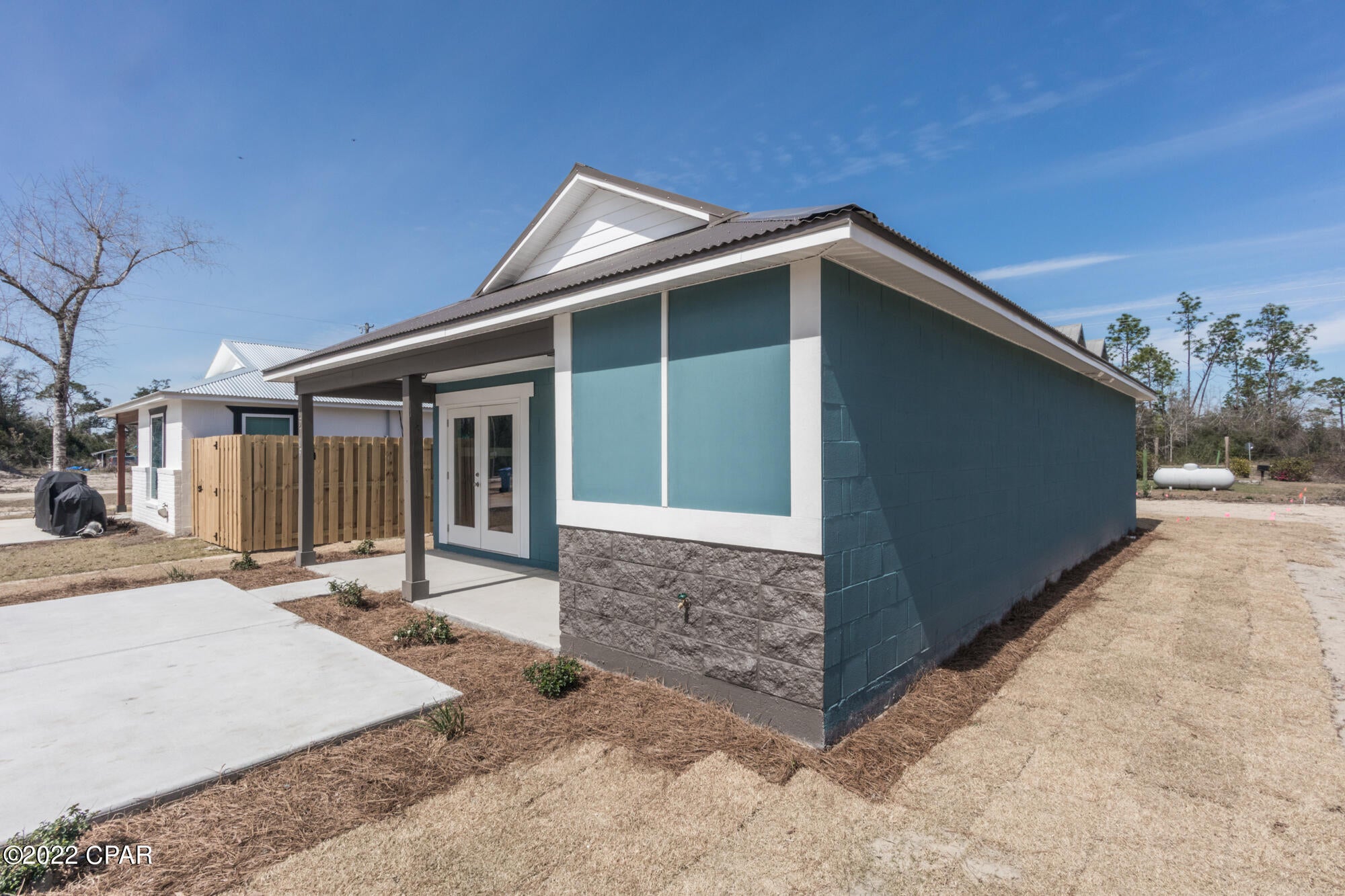 OPEN HOUSE SATURDAY MARCH 5th 10AM TO 2PM! Brand New Home! Concrete block construction with metal roof, open concept living area, and covered front porch. Low Maintenance and stylish concrete floors, new stainless appliances, Formica countertops, and  breakfast bar.  Features new septic, concrete driveway, well water, secondary roof water barrier, low-E windows, 17 Seer HVAC System. No HOA. Quiet area North of Panama City near Hwy 231 and Hwy 20. 30 Minutes to Panama City, 40 Minutes to Panama City Beach.

Pictures shown are of same construction but different floorplan. Exact colors and materials may differ. Buyer to verify all details.
