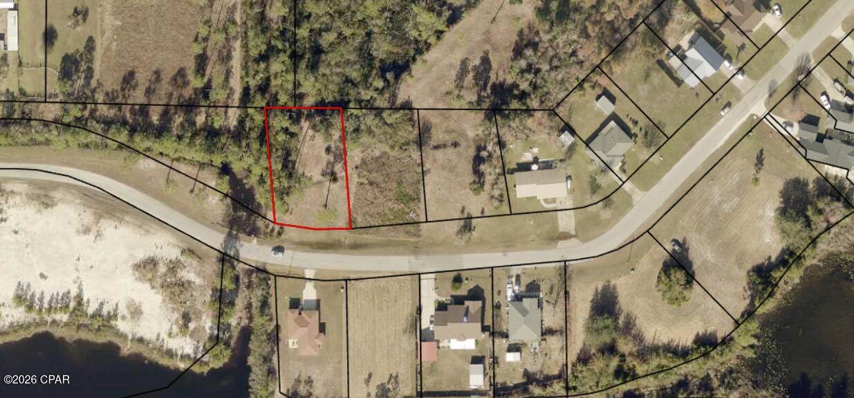 Build your new home on this 0.26-acre lot located in the Sandy Creek Country Club community. Water and sewer connections are easily accessible, and the property offers convenient access to Tyndall Air Force Base, grocery stores, shopping, dining, and other local amenities.