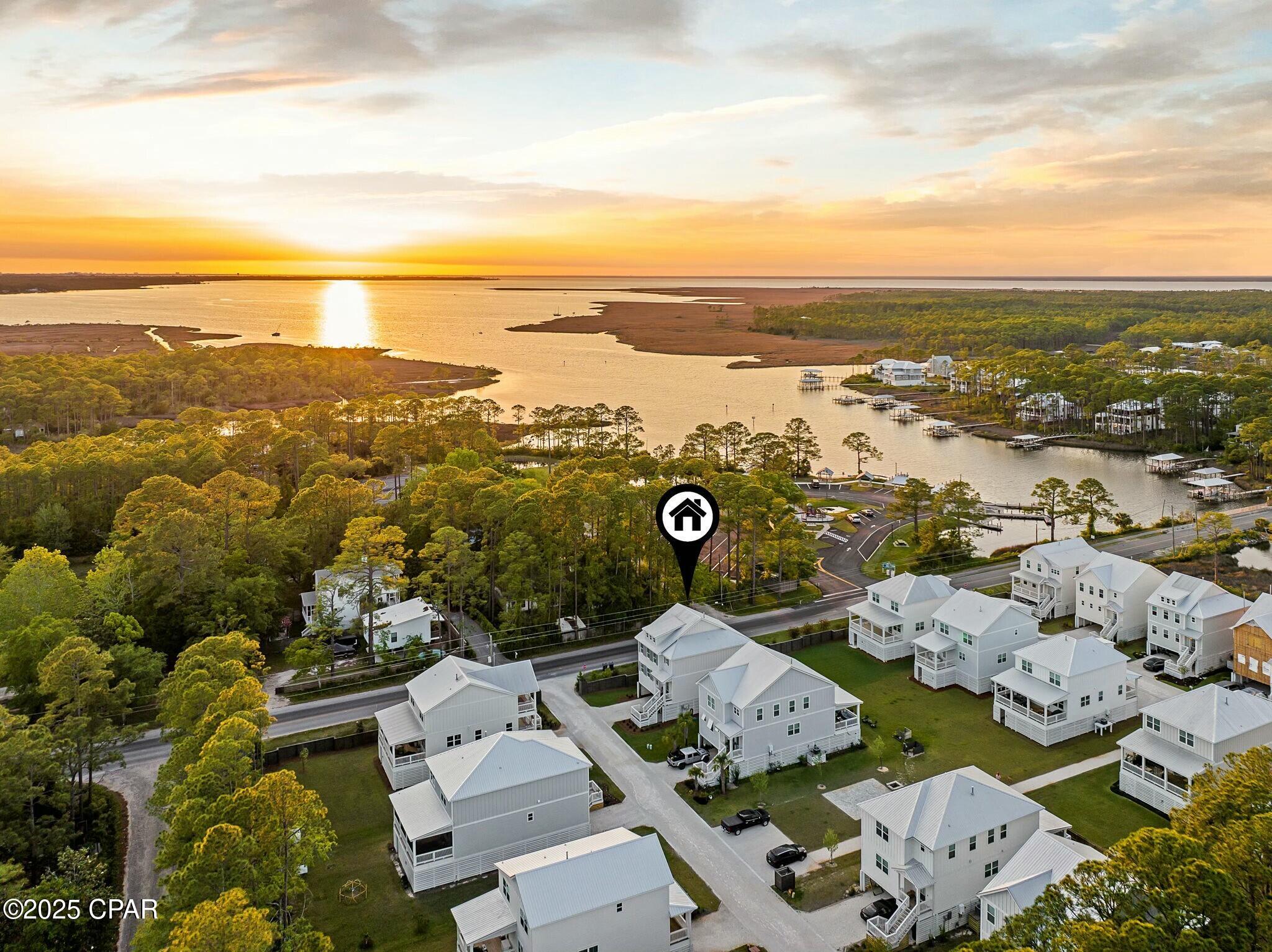 Discover coastal living at its finest in this beautifully maintained 3-bedroom, 2-bathroom home nestled in the serene Cessna Village community of Santa Rosa Beach. Spanning just under 2,500 square feet, this two-story residence offers an open-concept floor plan, perfect for modern living and entertaining.Step inside to an open-concept living area with abundant natural light. The updated kitchen features stainless steel appliances, quartz countertops, and a breakfast bar, seamlessly connecting to the large porch with stunning Bayou and Bay views. The spacious master suite boasts a walk-in closet and a luxurious en-suite bathroom with dual vanities, a soaking tub, and a walk-in shower.

Nestled in the peaceful, family-friendly Cessna Village neighborhood, this home is a water enthusiast's dream. Steps away from the Cessna Landing boat ramp, you can effortlessly launch your boat, jet ski, or kayak and be on the water in minutes. Enjoy boating to nearby bayfront restaurants or take a scenic 30-minute bay cruise to Crab Island and Destin Harbor for a day of adventure.