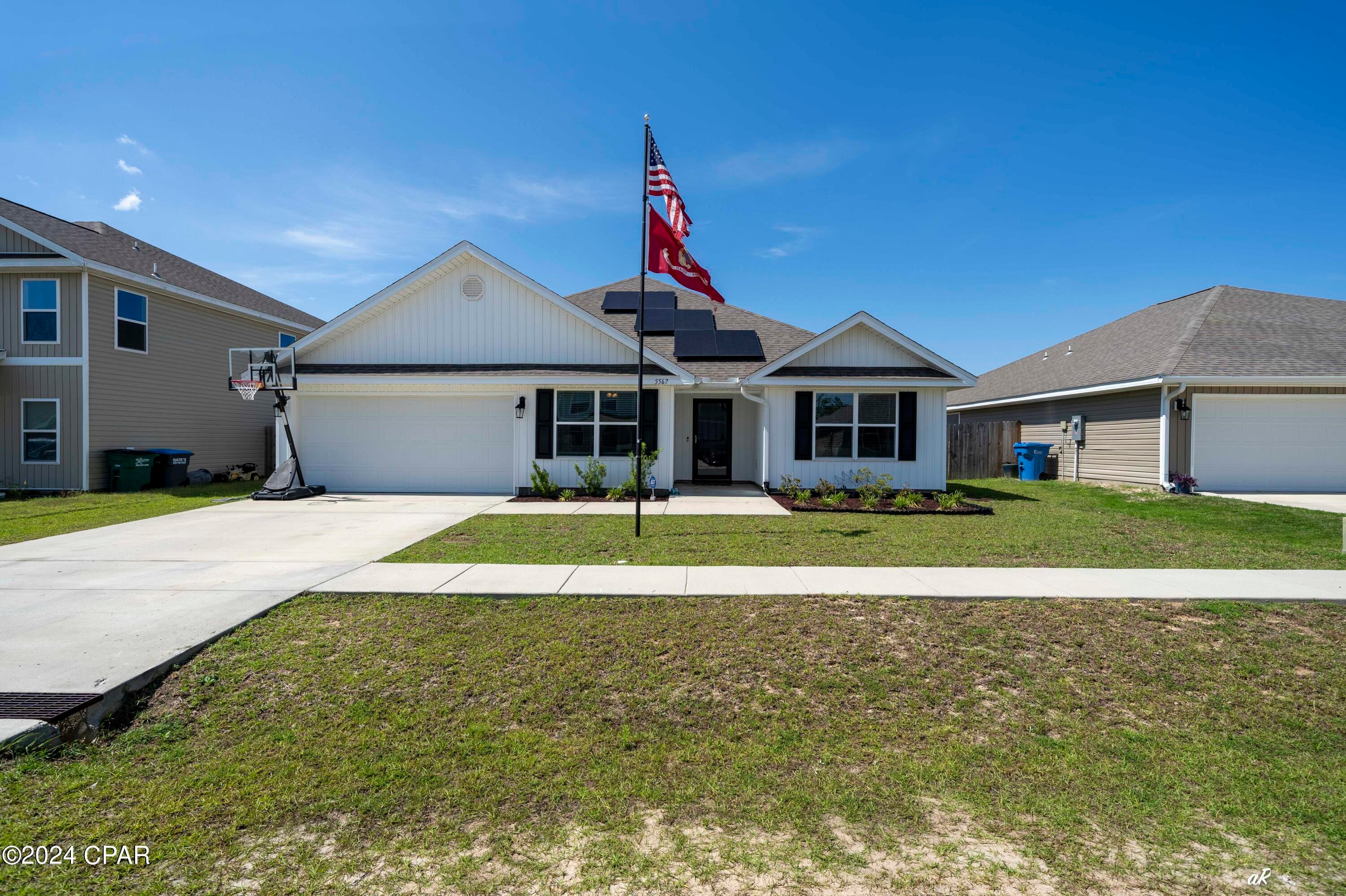 FOR LEASE ! Welcome to Mars Hill! A new community located in Panama City. One of the remarkable features of this community is that it is located directly across from Majette Park, which is home to Panama City's only Disc Golf Course. This is the Sawyer floorplan, a stunning 5 bed, 3 bath, 2 car garage home. Interior features of this home include laminate kitchen and bath countertops with over-mount sinks, traditional 8' ceilings, and beautiful ivory painted cabinetry. Vinyl flooring is throughout the home with plush carpet in all bedrooms. The home also features Whirlpool Stainless steel appliances which include a free-standing electric range, dishwasher, and microwave.