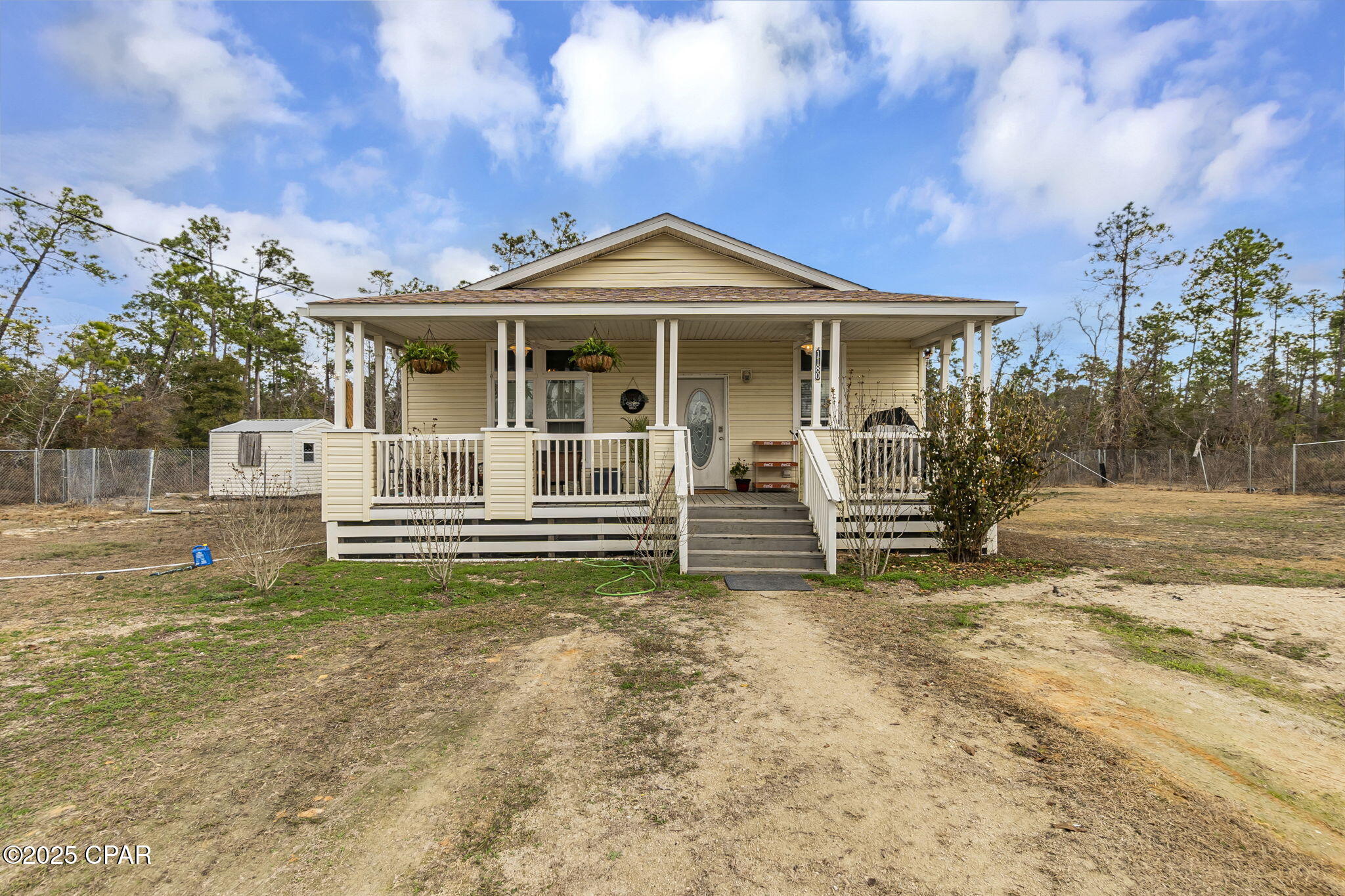 Enjoy quiet living in this nice 3 bedroom, 2 bath home. A very private setting just a few minutes from Compass Lake and McCormick Lake. Completely enclosed fencing will provide safety for pets, and plenty of room for gardening and chickens. Beautiful remote location yet only 25 minutes to Marianna for groceries, restaurants, shopping, hospital, and Chipola College. Outdoor storage building. Priced well below recent appraisal. Peaceful quiet country living in Alford, FL but not too far for visits to the beach.