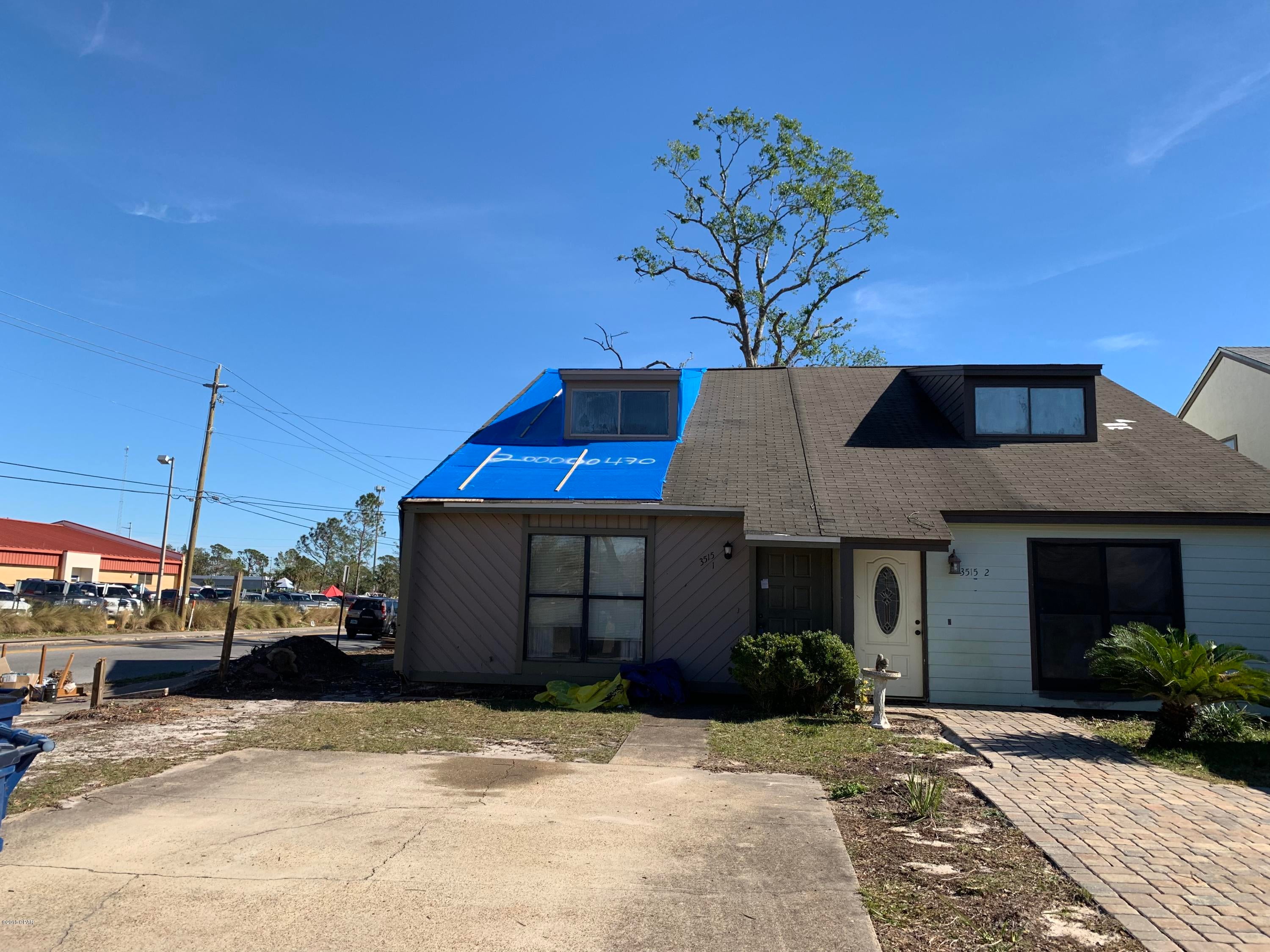 2 bedroom 2 bath townhouse entered for comp purposes only. damaged in the hurricane.