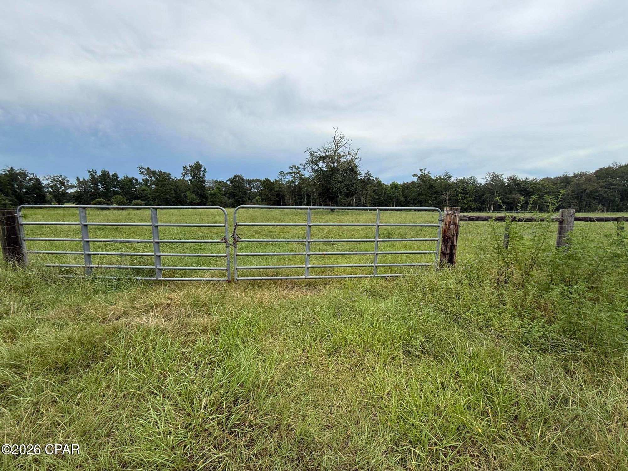 Look no further for your dream 8 acres of vacant, mixed land with pasture on the front half (about 4 acres) and timber in the back with some wetlands along the backside of the property great for duck hunting and wildlife habitat/management. The pasture section with 590 feet of highway frontage is already fenced and ready for your horses, hobby farm, or dream home.
Located just minutes from the Choctawhatchee River, you'll enjoy easy access to a nearby public boat launch--perfect for fishing, boating, or simply soaking in the natural beauty of the area. Whether you're looking to expand your agricultural operations, invest in land, build your dream home or create a private retreat, this property offers endless possibilities in a highly desirable location. Don't miss this unique opportunity to own usable acreage with both practicality and recreational appeal.


No well or septic on property.
No known restrictions.