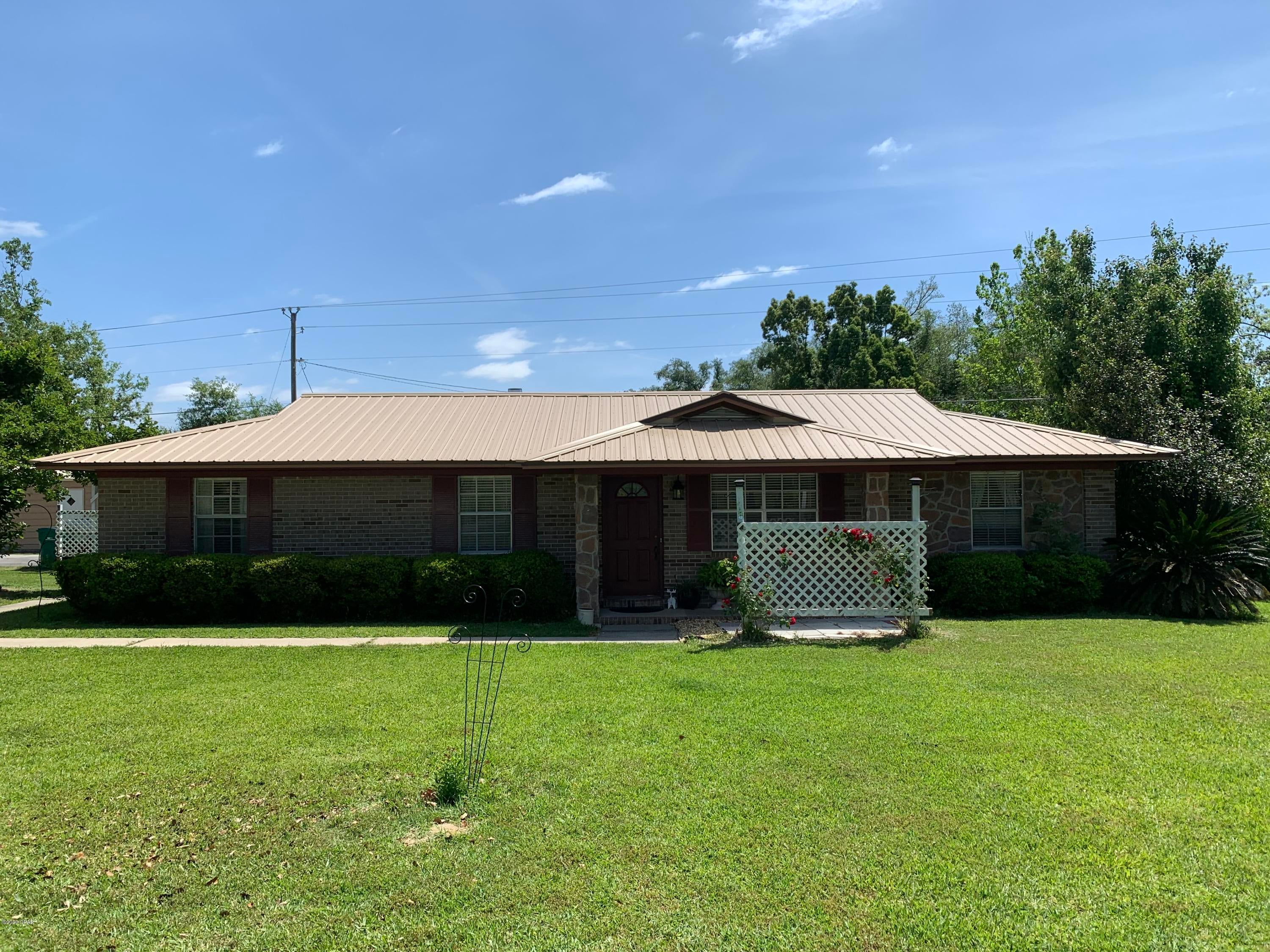 This 4 Bedroom 2.5 Bath split floor plan home, featuring a Large Beautiful Inground Saltwater Pool, is a must see. All Brick with a New roof in 2019, sitting on a 1.69 acre lot, giving it the perfect amount of privacy and comfort. Home features a large living room with windows throughout overlooking a nice screened in porch and pool. The master bedroom has a large walk in-closet and the master bath has a private door from the pool area and a large walk-in his and her shower. The outside of the home is completely fenced with a 2019 - 22 X 44 Metal Building on slab, part garage and part storage room. Property also has a carport and a small barn with a new roof and a second well. Relax on the nice screened in porch, float in the pool or sit out on the front porch and watch the sun go down, this home is country living at its best. Make an appointment today to see all this property has to offer!