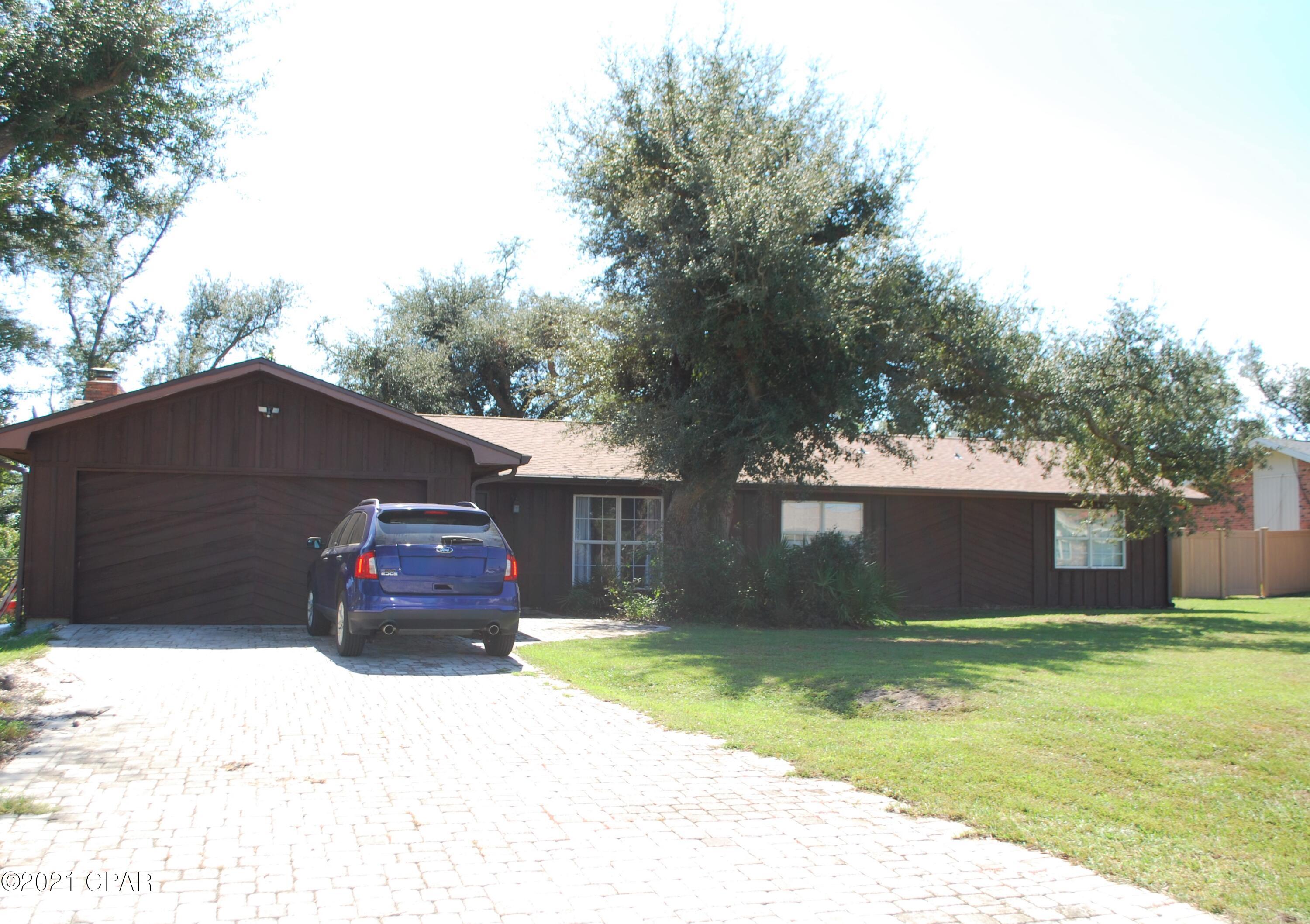 CURRENTLY UNDER CONTRACT, SELLER ACCEPTING BACKUP OFFERS. Wonderful ranch style home tucked away in the quiet neighborhood of Bayou Estates in Callaway. Featuring 4 BEDROOMS, 2 bathrooms, a large yard, AND hard-surface flooring throughout, this is the PERFECT layout. If you've ever had the desire to entertain, look no further as this home offers plenty of space for hosting with its living room, dining room, kitchen AND den, all flow into each other! The exterior beautifully displays a unique cedar wood siding design (also displayed on one of the home's interior feature walls) and you'll enjoy pulling up every day to the lovely paver driveway that continues along the walkway to the front door! Located just a stone's throw away from Callaway Bayou, this home is one you can't miss. Call today