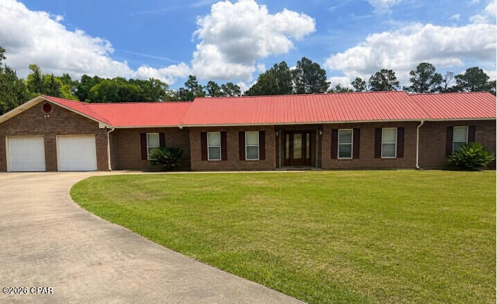 This spacious single-family home at 2778 Beall Packing Rd in Bonifay, FL, was built in 1980 and offers 5 bedrooms and 3 bathrooms, totaling 3,000+ sq. ft. of finished living space. Situated on a sprawling 11.74-acre lot, this property provides plenty of room to roam and enjoy the outdoors. With a charming country feel and ample space for privacy and relaxation, this home is perfect for those seeking a peaceful retreat in a rural setting.  The house overlooks a beautiful pond with a gazebo, for those ready to go fishing, and is close to the local golf course without being in an HOA.