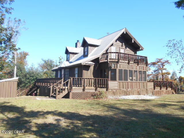 PENDED TAKING BACKUPS

This impeccable Chipola River Waterfront Home on 11.5 ACRES is what dreams are made of. It is indescribably gorgeous and awesome. Historic Chipola River is one of the nicest small rivers in the USA! The home is being sold way-way below new construction replacement cost. This cypress home is magnificently built and far exceeds codes! The pictures show what a wonderful paradise home this is inside and out. Too much here to tell about. It is a must to come see. The fishing on the river is fantastic and you can catch fish right off the huge 1300 square feet dock. This river is often crystal clear, except after heavy rains, & home to rare Shoal Bass & Largemouth Bass & bluegills & more! Great Hunting Area! Includes a nice boat landing 100 feet away!