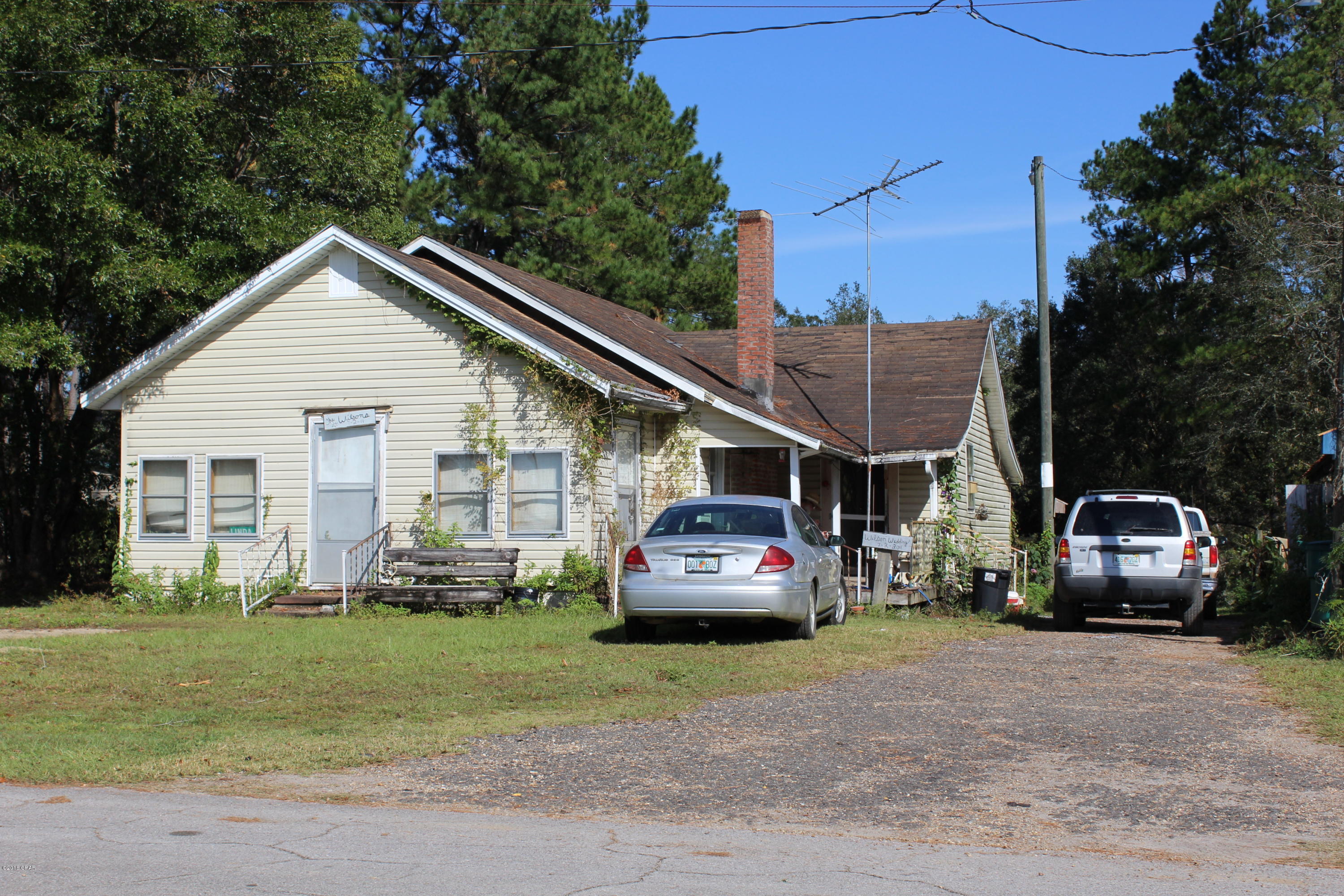 CREEK FRONT! Enjoy Holmes Creek in your backyard! Property features a vintage home and an older block building.

Room measurements are approximate.