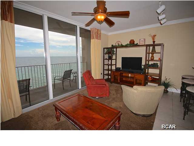 This is a popular ''M'' floor plan which features two bedrooms, bunk alcove and THREE FULL BATHS! Perfect for rental guests. This unit is ready to go for the rental season. If you are looking for an amenity rich building, Tidewater is #1! Enjoy lunch at the new ''Waves'' restaurant overlooking the gulf on the second floor, or work-out in our state of the art Fitness Center. Then relax in the Roman Spa tubs or have a steam or sauna. Movie night is a favorite with families in our 70 person stadium style Movie Theater and kids love the game room. Enjoy our 631 ft of beach or swim in one of our two 4200 sq. ft. freeform Pools. We also have a heated indoor pool for winter or rainy days. Stay in touch with internet access in all units and a stroll to Pier Park for shopping, dining or the latest movies. Owners have access to a Private Owners Lounge on the top floor complete with bar, flat screen TV's and plenty of seating for a relaxing evening. Large groups can meet in our Conference Center. Unit features 9 foot ceilings, crown molding in the living/dining area, and granite kitchen countertops. This plan is a great rental unit as it can be set up to sleep eight people. There is a covered parking garage and a covered walkway from parking deck to the building. Tidewater is one of the best locations on Panama City Beach, located 1/3 of a mile west of Simon Property Group's Pier Park development.