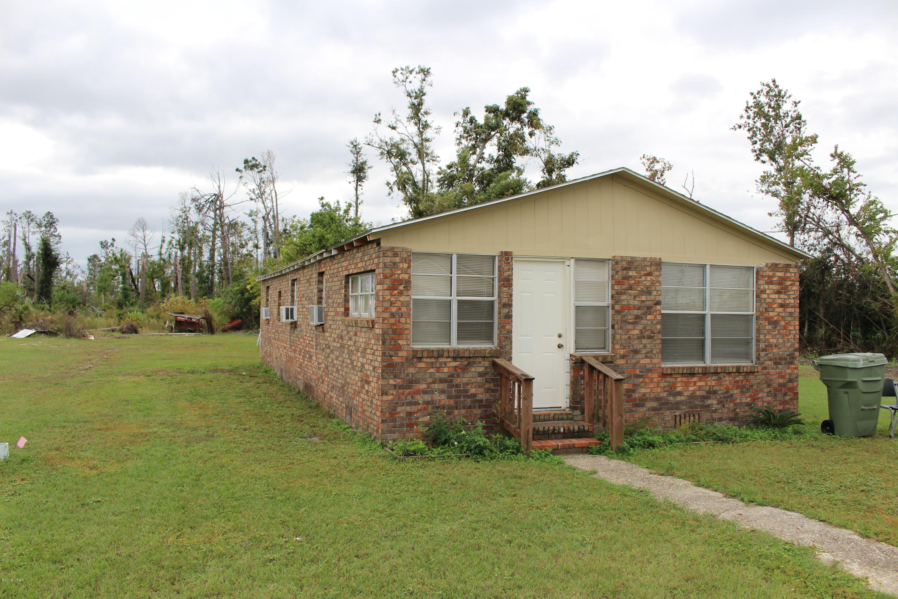 Brick home located very conveniently located just off Hwy 77, 836 sq feet but offers three bedrooms with window air conditioning in each room. Washer & Dryer Connections in laundry room. 

0.33 Acre Lot - not fenced.