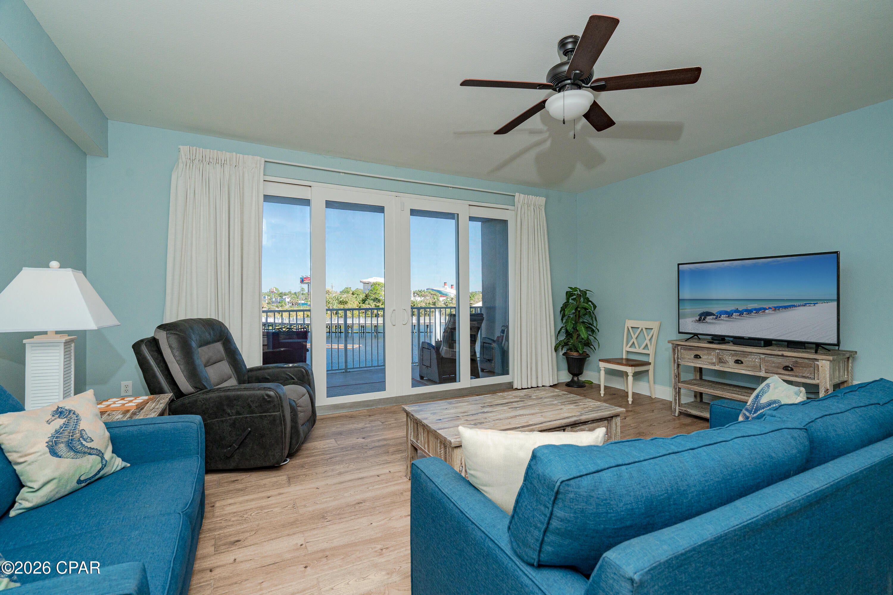 Enjoy easy first-floor living and skip the elevator waits in this inviting 1-bedroom, 2-bath condo at Laketown Wharf Resort. Featuring peaceful lake views, no carpet throughout, bunk rooms allowing up to 7 occupants/guests. This unit feels bright, coastal, and ready for its next owner to love.

The spacious layout offers plenty of room to relax after a day at the beach, while two full bathrooms provide added convenience for owners and guests. The bunk room has an added barn door allowing the kids to have a  zone away from the open living space. Step outside and enjoy the beautiful lakefront setting, nightly fountain light show at eye level, and private boardwalk surrounding the lake.

Laketown Wharf offers an impressive collection of resort-style amenities, including five pools, two hot tubs, a Gulf-view fitness center, putting green, and multiple onsite restaurants. The resort is also home to 810 Billiards & Bowling, featuring bowling, billiards, arcade games, and axe throwing for rainy-day entertainment.

Whether you are searching for a personal coastal getaway or an investment-ready vacation rental, this first-floor condo offers the perfect combination of convenience, amenities, and location near the white sands and emerald waters of Panama City Beach. New memories and new stories are waiting to be created here!