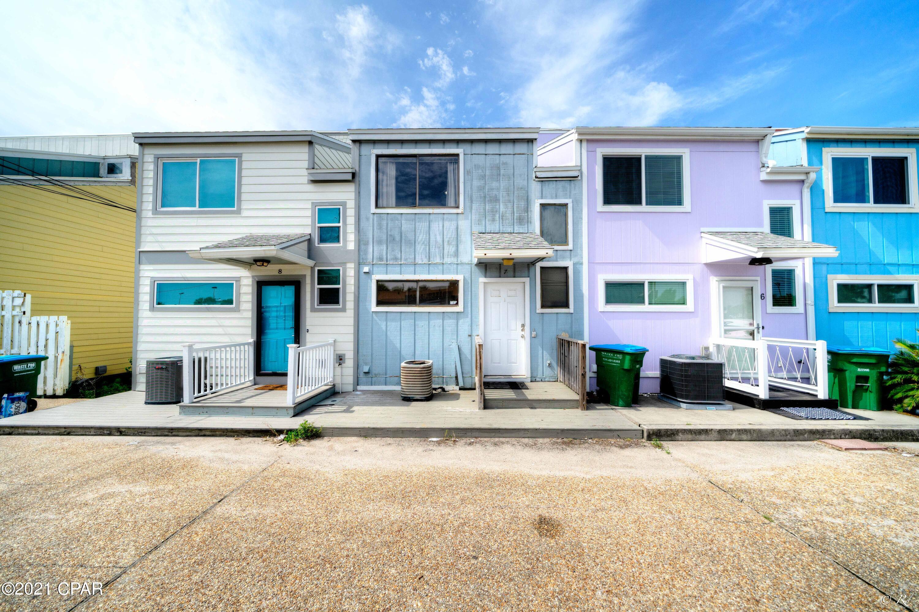 2 bed, 2.5 bath townhome with a BEAUTIFUL water front view of the Gulf! The main living area leads out to the back deck area with private access to the beach just a few steps away.  The kitchen is equipped with a breakfast bar, black and white appliances, and lots of white cabinet space.  The master bedroom boasts floor to ceiling windows with a gorgeous view of the Gulf. The two bedrooms are equipped with their own private ensuite. The master bathroom features a shower/tub combo with a sliding glass door, a large vanity, and tile flooring. This two story townhome is the perfect vacation rental spot! On top of being just a few steps away from the white sandy beaches, this townhome is near a plethora of grocery stores, restaurants, and entertainment.  This home is also just a short 5 minute drive from Pier Park! Come check this out today! This is a short sale..please allow up to 90 days to close.