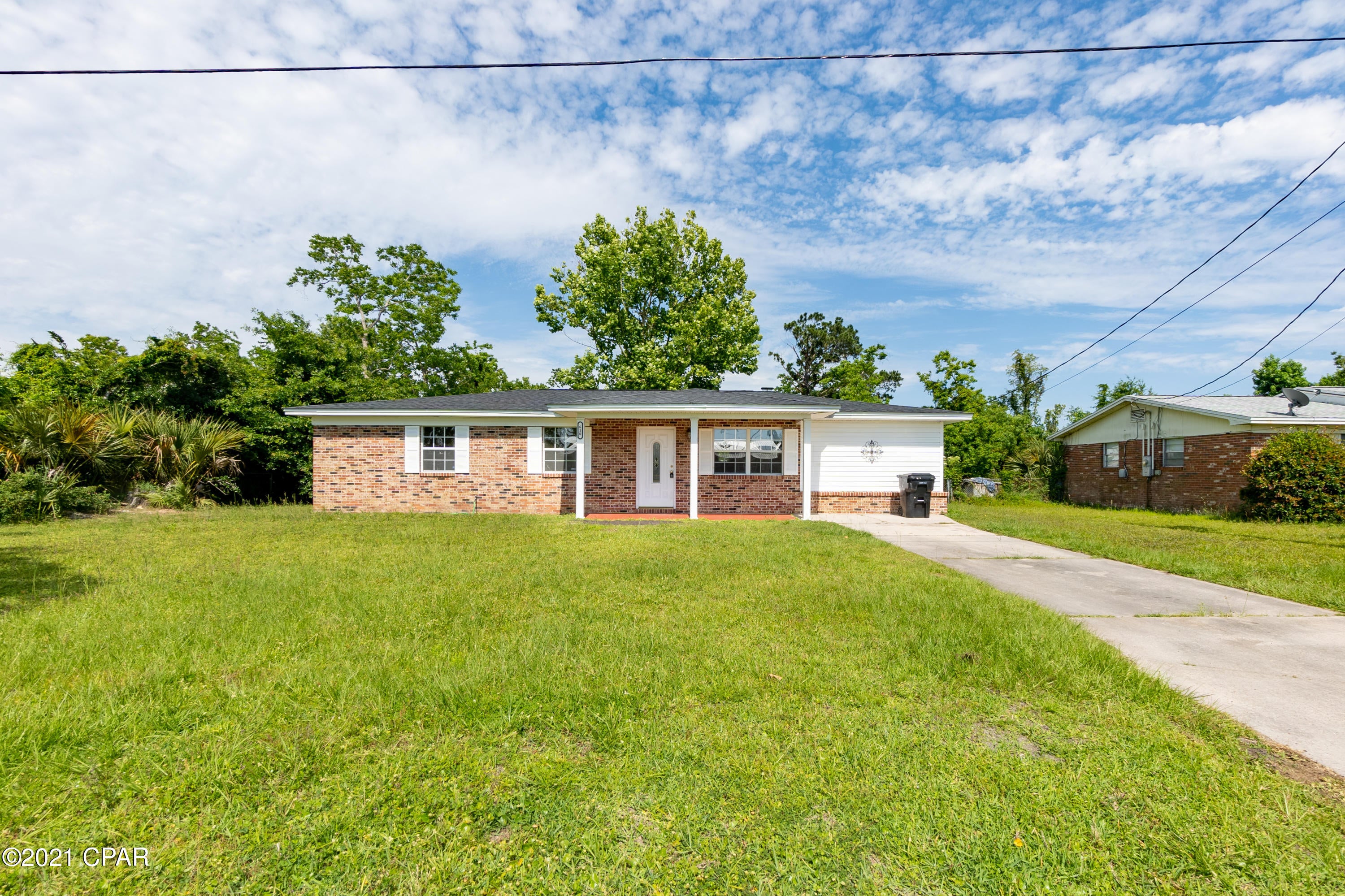 Renovated Home with Fresh Paint, Open Floor Plan, wooden deck, and New Bedroom Carpet. This home boasts a detached Garage, Large Living Room with Fireplace, a XL Laundry Room, Large Guest Bedroom, and a Spacious Kitchen with lots of cabinet and counters space any chef would love.  Also, it has a breakfast bar and a large dining room great for family and friends to meet and eat.  There is also room for a home office space.  Come see this floor plan and see for yourself just how perfect this home is and how it fits you and your needs.  All info and measurements are approx., buyer to verify all deemed important.  Call today for your private showing and secure your new home before someone else does.