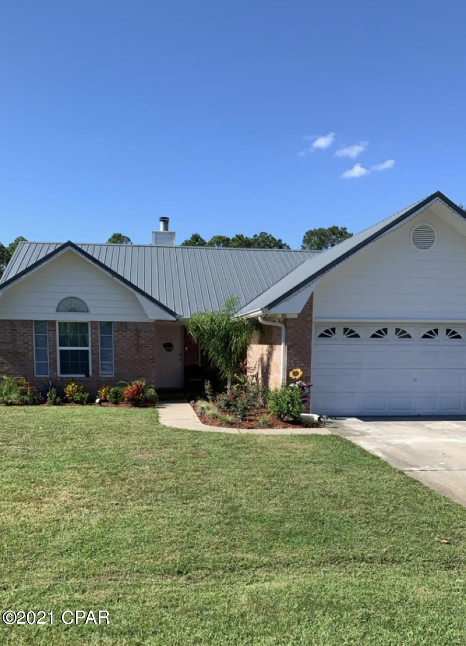 This home is in a great location being near the new sports park and upcoming school being built.  New flooring, paint, kitchen cabinets and so much more.  Cathedral ceiling in the living room with a wood burning fireplace.  Screened in porch overlooking a fenced in backyard.  No HOA fees.