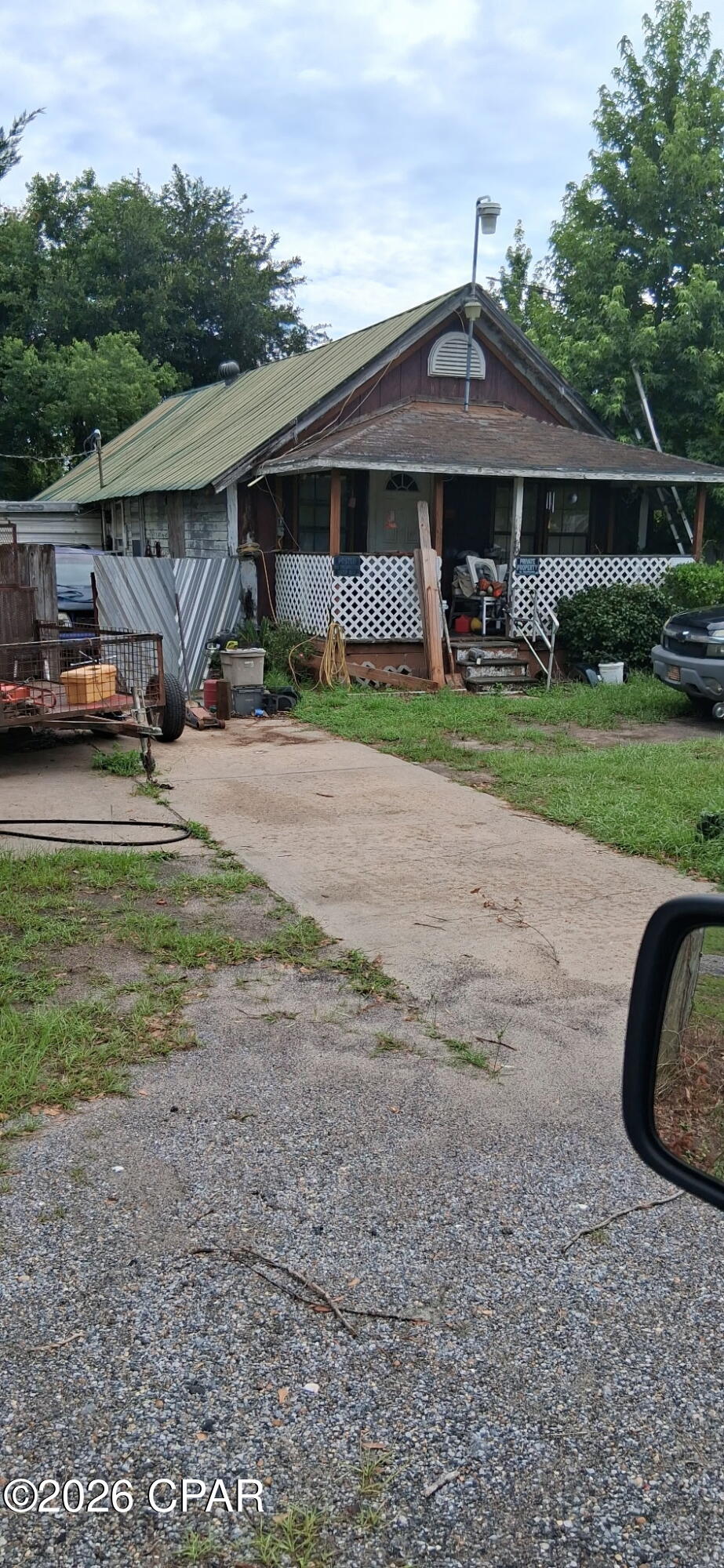 Nice Lot  A delightful country setting with some fencing and a great big yard. Plenty of room for animals and kids, Close to all the shopping and eating places you will ever need. Home needs lots of work. No inside pictures as occupent is a hoarder.
