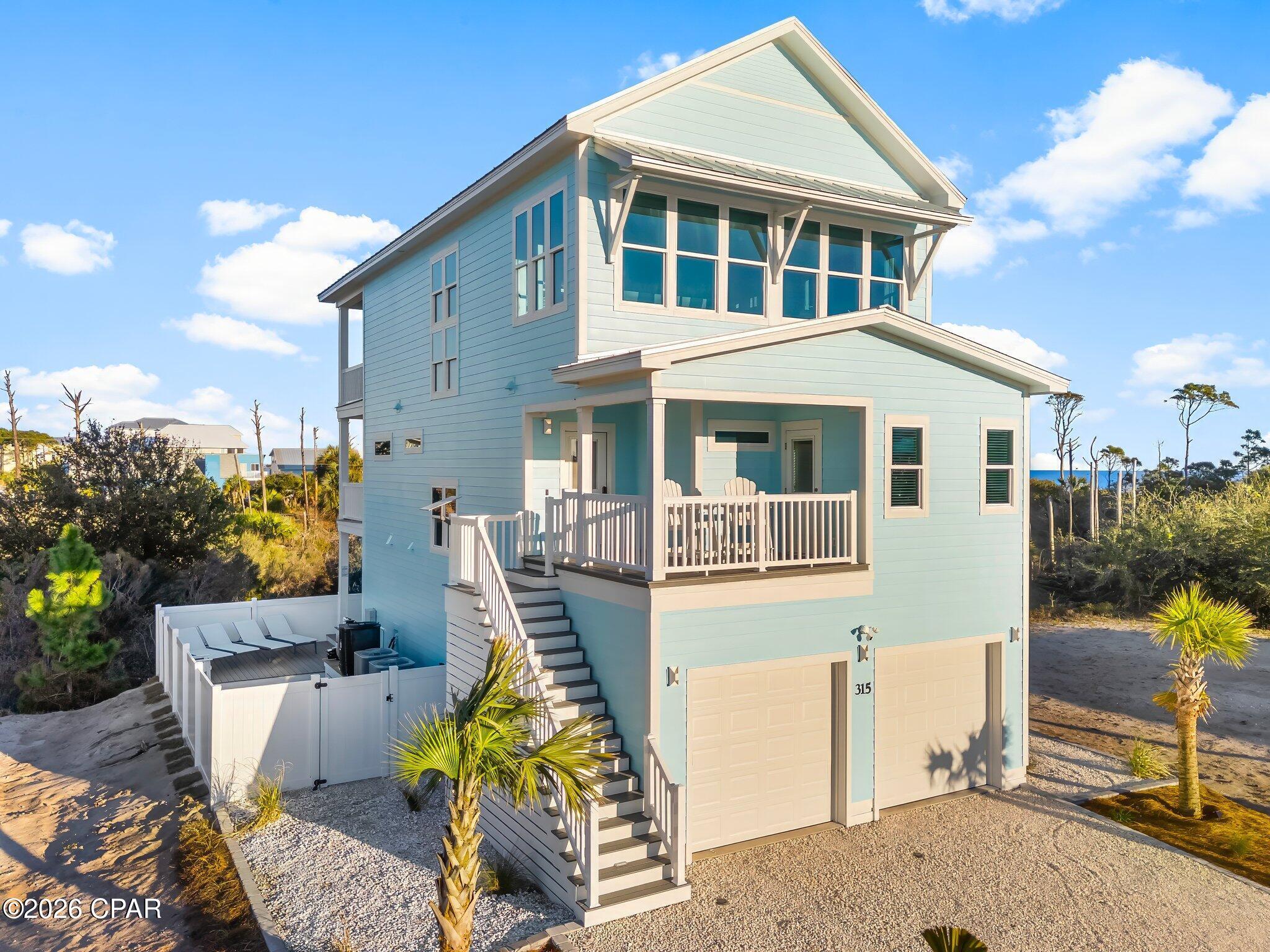 Welcome to Aqua Breeze, an impressive newer luxury beach home in the exclusive gated Villa Del Sol community of Cape San Blas. This spectacular 4-story, 6-bedroom, 6.5-bath coastal retreat combines exceptional design, space and amenities with outstanding potential as a primary residence, second home, or rental investment.

The Gulf-view primary suite features a king bed, private balcony, luxury en-suite bath and dramatic oversized shower with a full glass wall. A second Bay-view primary suite with private deck access and a spa-inspired bath. Additional king and queen bedrooms plus a bunk room provide excellent flexibility for family and guests.

Enjoy Gulf and Bay views from 6 spacious decks, amazing sunrise views to drink your coffee and beautiful coastal evenings. Outside, your private resort-style retreat features a heated pool with 3 waterfalls, fenced pool deck, firepit, outdoor shower and gathering areas.

Designed for entertaining, Aqua Breeze provides a movie room with large-screen TV, oversized sectional and surround sound, plus a game room with board games and lounge seating. The coastal-modern living room features an electric fireplace.

Two full kitchens, including a chef-inspired main kitchen with quartz countertops, stainless appliances, large island and coffee bar, make entertaining effortless. Two dining areas and 2 laundry rooms provide added convenience.

Additional features include a 4-stop elevator, commercial ice maker, Starlink internet, digital locks, Wi-Fi thermostats, EV charger, 2-car garage and parking for up to 8 vehicles.

Enjoy beach access and the incredible lifestyle of Cape San Blas-sandy beaches, boating, fishing, kayaking and nearby St. Joseph Peninsula State Park. Aqua Breeze delivers luxury, versatility and the best of Florida's Forgotten Coast.