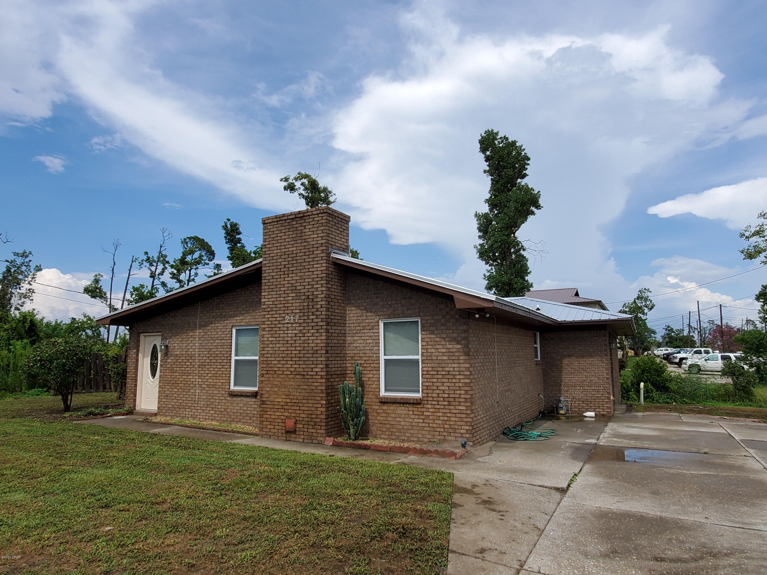 For rent. Located just 10 minutes from Tyndall Air Force base, the home is perfect for military personnel. It has 3 bedrooms, 1 bathrooms with vinyl plank flooring and tile throughout the home. Large living room with wood-burning fireplace. Kitchen features a refrigerator with ice maker, stove/oven, and dishwasher. Washer/dryer included with the home; **Pets negotiable with $250 non-refundable pet fee.