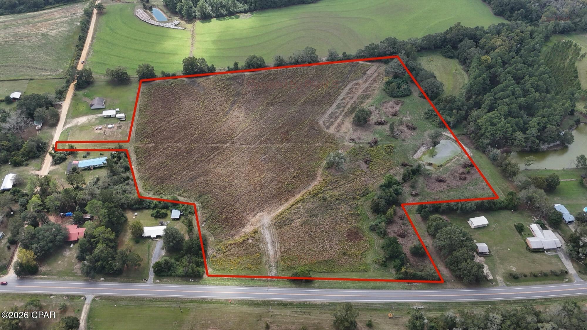 **23.5 Acres of Cleared Pasture with Pond & Road Frontage!**

Discover the possibilities with this beautiful 23.5-acre parcel featuring cleared, open pasture, a scenic pond, and both highway and dirt road frontage. With plenty of usable acreage, this property offers a great opportunity for a future homesite, mini farm, livestock, recreational use, or investment.

Enjoy the peaceful country setting and wide-open space while still being conveniently located near local amenities. Poplar Springs School is just a few miles away, and Panama City Beach is just over an hour's drive, making it easy to enjoy a day at the coast while coming home to the quiet of the countryside.

Whether you're dreaming of building a home, starting a farm, or simply investing in your own piece of land, this property offers the space and flexibility to make it your own.

Contact your agent today to schedule a showing and explore the possibilities this 23.5-acre property has to offer!

Buyer and Buyer's Agent to verify all measurements, acreage, zoning, land use, school information, and any other information deemed important to the purchase of the property.