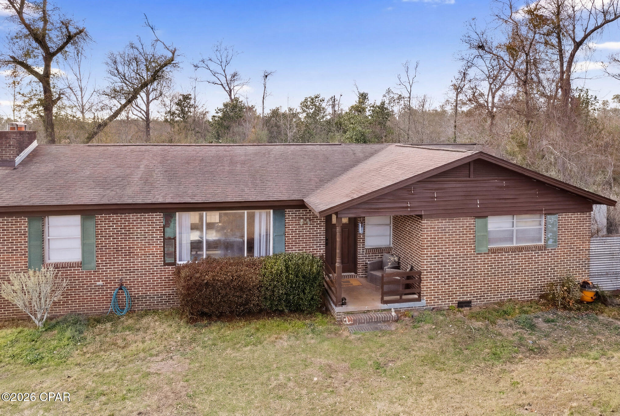 3-bedroom brick home situated on over an acre of land just off Highway 231, offering convenient access to Panama City while still providing a quiet and spacious setting. This property features a functional floor plan with comfortable living areas and plenty of potential for a buyer looking to add their own updates or personal touches.



The solid brick construction offers durability and low exterior maintenance, while the expansive lot provides endless possibilities. With over an acre of land, there is ample room for boats, RVs, trailers, additional parking, or future improvements.



The fenced backyard offers privacy and a great space for pets, outdoor entertaining, or creating your own outdoor retreat. Whether you're looking for a primary residence, rental investment, or a property with room to spread out and no HOA restrictions, this property offers strong potential and flexibility.



Seller is willing to replace the roof prior to closing with an acceptable offer if needed for financing or insurance purposes.



Seller has already begun addressing some needed repairs and updates, including flooring and interior painting.

Measurements are approximate. Buyer to verify any information deemed important. Photos may include Virtually Altered
