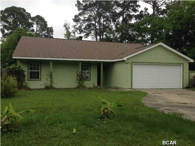 Over 2,000 sq ft 3BR/2BA home with a bonus room! Bonus room would make a great media area, game room, office or playroom. This home has been recently updated with new tile and bamboo flooring. Split floor plan, fireplace, large eat-in kitchen, updated lighting and more. The master bathroom has double sinks, private water closet and TWO walk in closets. The back yard is HUGE and fenced in. There is a nice extra driveway to side gate for parking boats, RV's, etc. Relax on your brick paved terrace off the kitchen! Vacant and ready to move in! Near TAFB and only a short drive to Panama City Beach! Ask about RENT TO OWN!