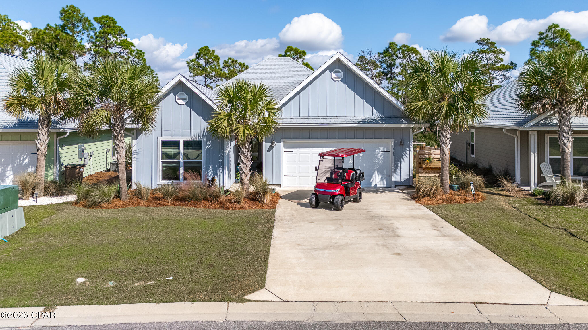 Fully Furnished with Golf Cart - Dual Living Spaces & Private Mother-in-Law Suite! This exceptional Kennedy floor plan offers 4 bedrooms and 3 full baths, designed with versatility in mind. One side of the home features a private mother-in-law suite complete with its own entrance, kitchen, full bath, bedroom, Livingroom and washer/dryer hookup--ideal for guests, extended family, or rental income potential. The main living area has its own private entrance and showcases an open-concept design with 3 spacious bedrooms and 2 full baths. The kitchen is the heart of the home, featuring a large granite island, stainless steel appliances, and generous pantry--perfect for gathering and entertaining. Custom cabinetry in the laundry room adds extra storage and style, while the fenced backyard provides privacy and space for outdoor enjoyment or your furry friends. Low-maintenance Bermuda grass thrives in the coastal climate, and the home is sold **fully furnished--including the golf cart--**making it truly move-in ready. Located in the sought-after WindMark Beach community, residents enjoy two resort-style pools (one heated in winter), scenic walking and golf cart trails, playground, community firepit, and the vibrant Village Center with shops, dining, and pet-friendly beaches just blocks away. Whether you're seeking a full-time home, coastal getaway, or income-producing property, this one has it all! Schedule your private showing today.