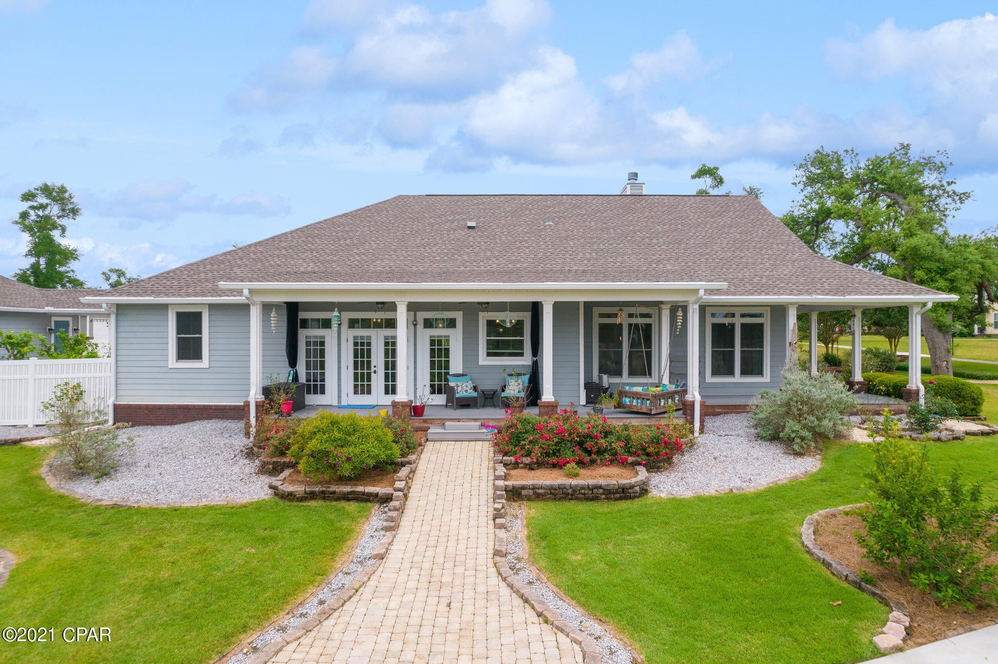 Welcome home to 4000 Riverside Drive!  This charming and idyllic Florida Cottage is located on an incredible corner lot in the heart of the community's most desired and central point.  This single story home bodes a beautifully spacious open main living floor plan with three bedrooms, three bathrooms and comes to you having been meticulously well maintained. In addition, there are some custom made items that will convey with this lovely home. Items included are the 84'' screen and projector in media room, a custom designed Queen Stella Desk/Bed combo (Value-$9,500), New Age Custom Garage Cabinets (value-$3,500), and a new pergola in courtyard.  This home has everything that anyone could want and its located where everyone wants to be.  This gorgeous coastal home will not last long!