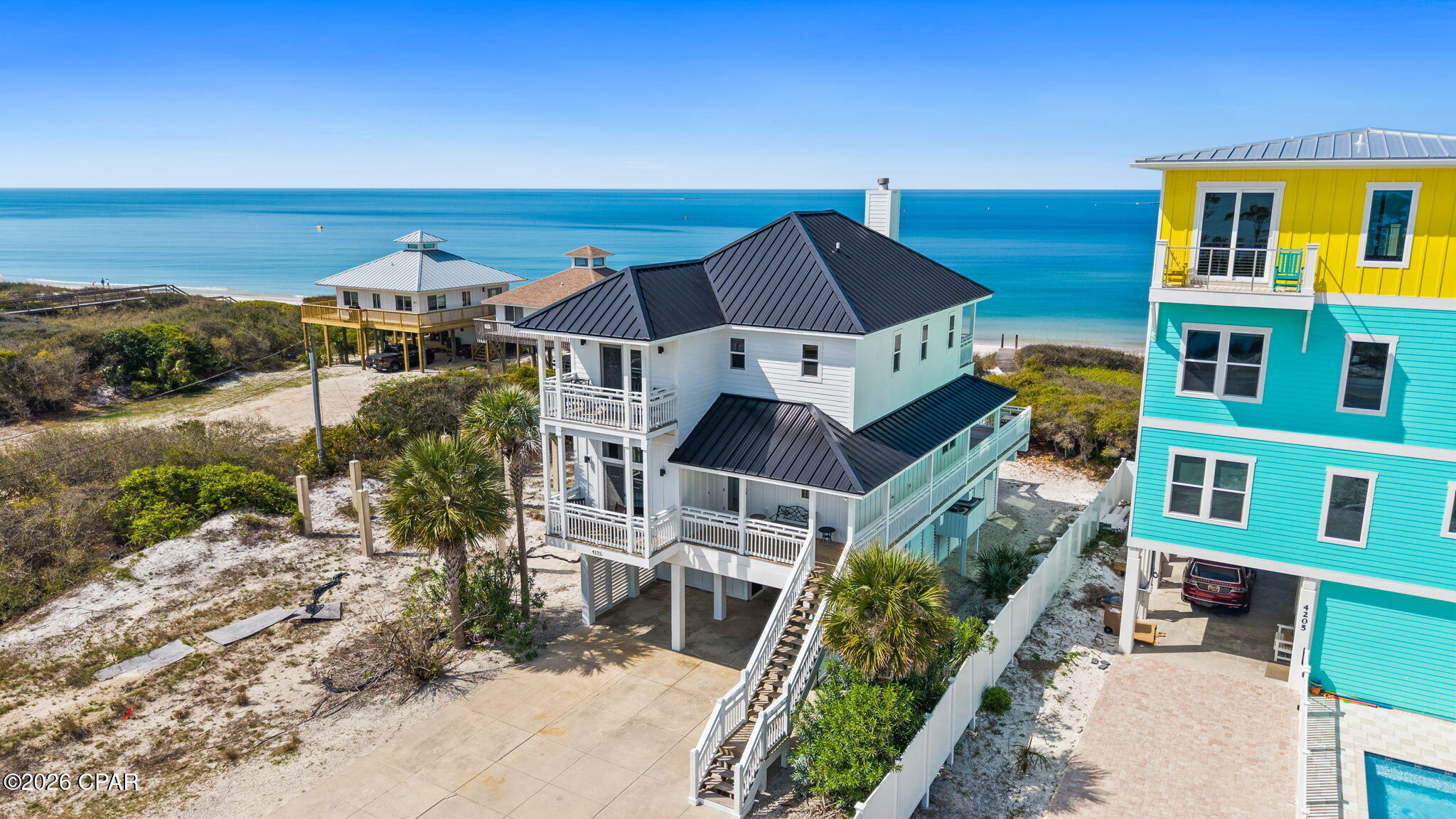 This stunning Gulf-front home on the north end of Cape San Blas offers the perfect blend of luxury, comfort, and convenience--along with $96,047 in gross rental income for 2024 and $85,355 for 2025. With no HOA, over 5,000 total square feet, 4 spacious bedrooms, 4 full bathrooms, and a private elevator servicing all floors, this property is both a long established short term rental and a beautifully designed coastal beach home. Every bedroom features its own private balcony offering breathtaking views of the Gulf of Mexico or St. Joe Bay. On the north Cape, the sun sets directly over the water, creating picture-perfect evenings and making this section of Cape San Blas the most desirable on the peninsula. Whether you're enjoying morning coffee with a bay view or winding down with a sunset show over the Gulf, this home delivers unforgettable moments. Inside, the home is tastefully furnished with an invigorating coastal design. All furnishings convey with the sale making it truly turnkey.  Located near local favorites like Scallop Cove general store and bait & tackle shop, and St. Joe Shrimp Company, you'll have everything you need just a short drive or bike ride away.  When it's time to explore the Cape's natural environment, the whole family can enjoy St. Joseph Peninsula State Park, just minutes away. From beachside picnics to bayside paddling, snorkeling, and fishing--plus easy boat access at Eagle Harbor--you'll have adventure and relaxation at your convenience. For daily exercise or a peaceful evening ride, take the pedestrian path that stretches the entire length of Cape San Blas, perfect for walking, jogging, or biking along the coastline.  Whether you're looking for an investment, a second home, or your own private beachfront getaway--this property checks every box. While all information is believed to be accurate, Buyers are to verify all details they find important to their purchase, including property dimensions, zoning, and any applicable restrictions.