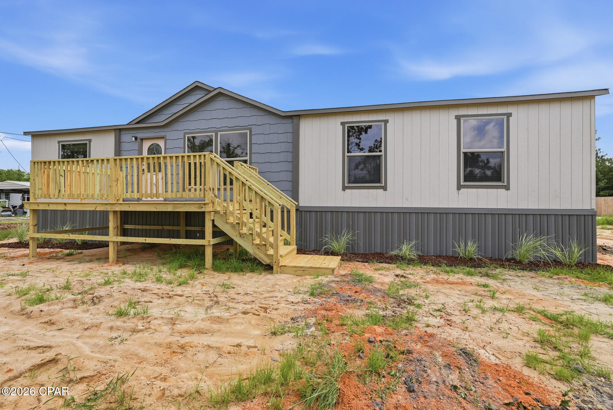 Beautiful new manufactured home on a private 1-acre lot in the desirable Bayou George area of Panama City. This upgraded 4BR/2BA former model home features enhanced flooring, upgraded bathrooms, and a stylish kitchen with quality finishes throughout. All new utilities including new septic and well.  Situated on a quiet, low-traffic street, you'll enjoy peaceful country living with easy access to nearby boat ramps, fishing, boating, and outdoor recreation. Conveniently located just 20 minutes from Downtown Panama City and 25 minutes from the Gulf Coast beaches. The spacious homesite offers plenty of room for a pole barn, detached garage, workshop, RV parking, boats, and more. An additional separately platted 1-acre lot located directly behind the property is also available for purchase. Move-in ready with space to grow in one of Panama City's most desirable rural communities.