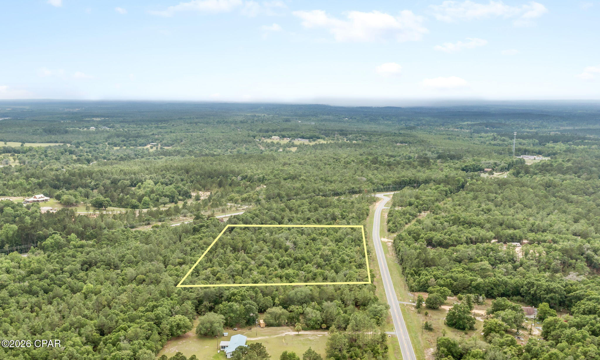 Escape the ordinary and build your dream on this beautiful 5.76± acre homesite. Tucked away in a peaceful country setting, this wooded parcel offers the perfect blend of privacy, natural beauty, and convenience. Towering pines and mature hardwoods create a picturesque backdrop, giving you the freedom to design the home you've always envisioned while enjoying plenty of space for a workshop, barn, garden, or recreational area. A recent survey has already been completed, giving buyers added confidence and a head start in planning their future build. Whether you're looking to build your forever home, establish a private homestead, or invest in land for the future, this versatile tract offers endless opportunities. Located between Chipley and Lynn Haven, you'll enjoy the tranquility of country living without sacrificing convenience to shopping, schools, dining, and everyday amenities.