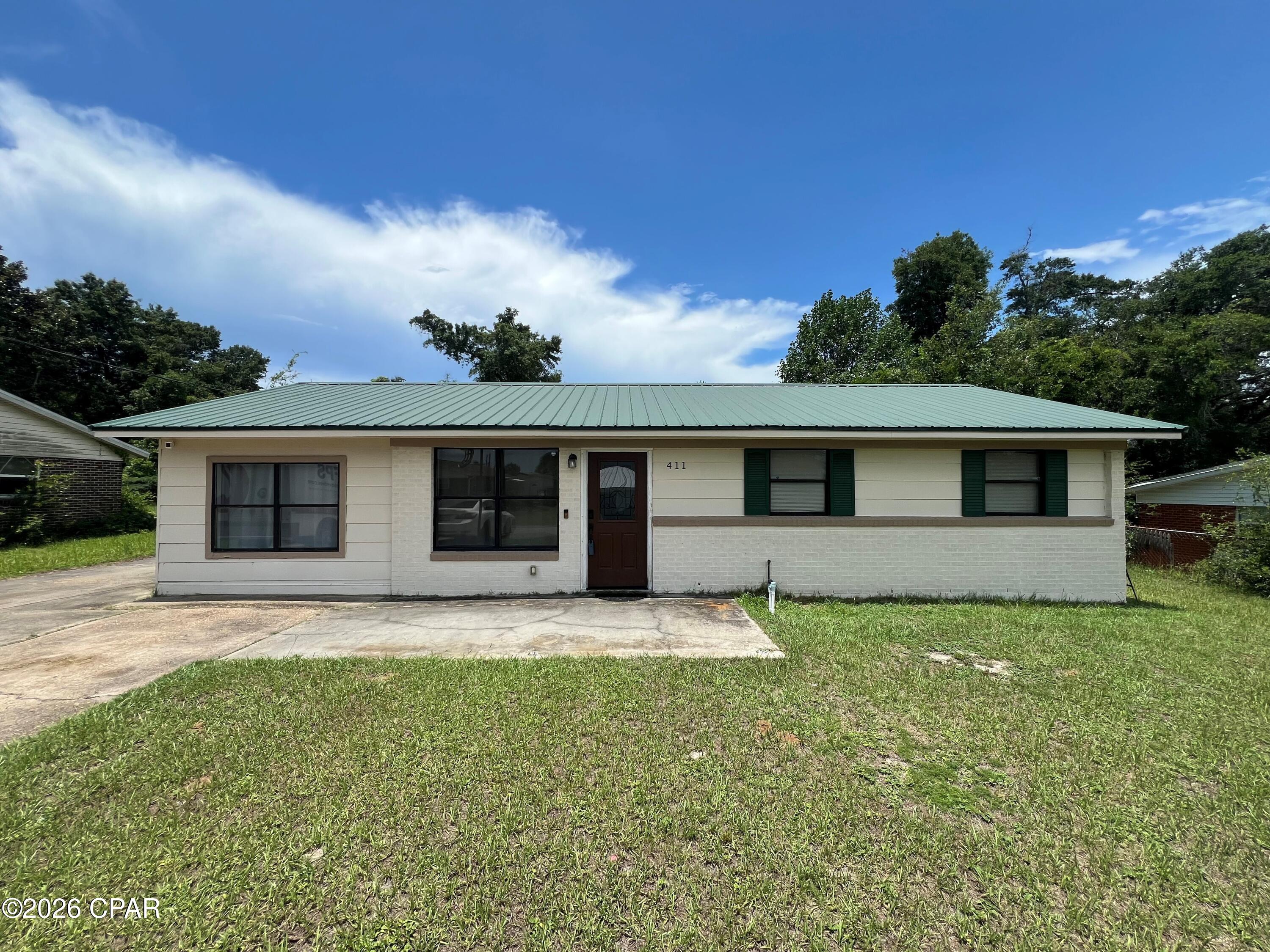 'CURRENTLY UNDER CONTRACT, SELLER WILL CONSIDER BACKUP OFFERS'    Charming Cottage.  Up-to-date with open floorplan, fresh LVP flooring,  Fresh kitchen cabinets,  granite countertops and custom showers in both bathrooms.  New metal roof in 2019. 
Great location , close to Tyndall A.F.B , schools and shopping.
Originally built in 1965 with an Effective Year built of 2015