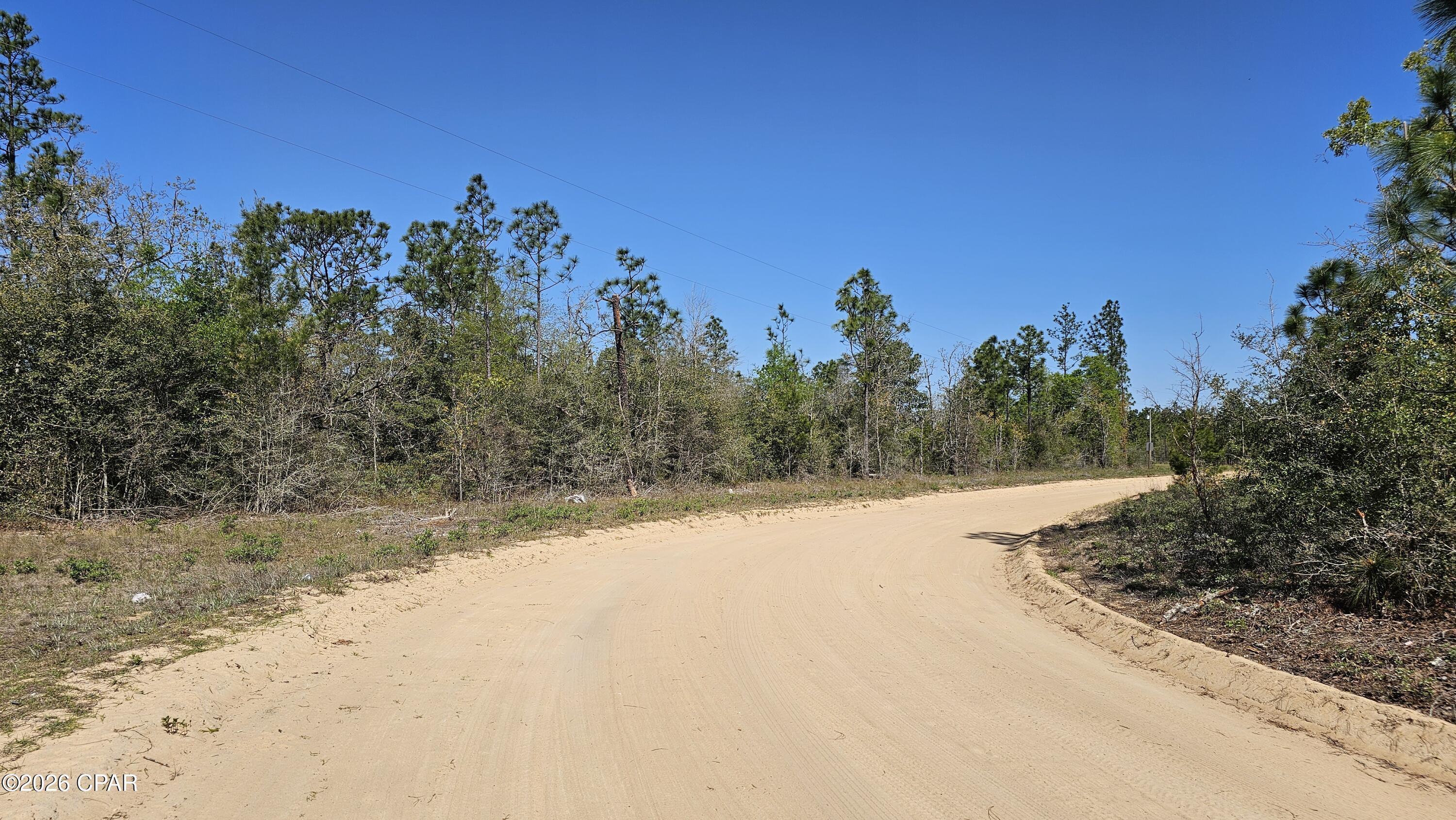 BACK ON THE MARKET DUE TO NO FAULT OF THE SELLER! What's not to like about 4.07 lightly wooded ACRES at this amazing price?! Build the home you're going to love in Washington County, the heart of the beautiful Florida Panhandle. Great access to I-10 as well as our gorgeous white-sand beaches and the emerald-green waters of the Gulf! Don't forget all the fishing lakes and ponds as well as tons of fun, recreational springs! Call RIGHT NOW! Get your questions answers and make your offer. ** PS This road has power poles! Owner has a nearby 4.67 similar lot also listed for sale. **