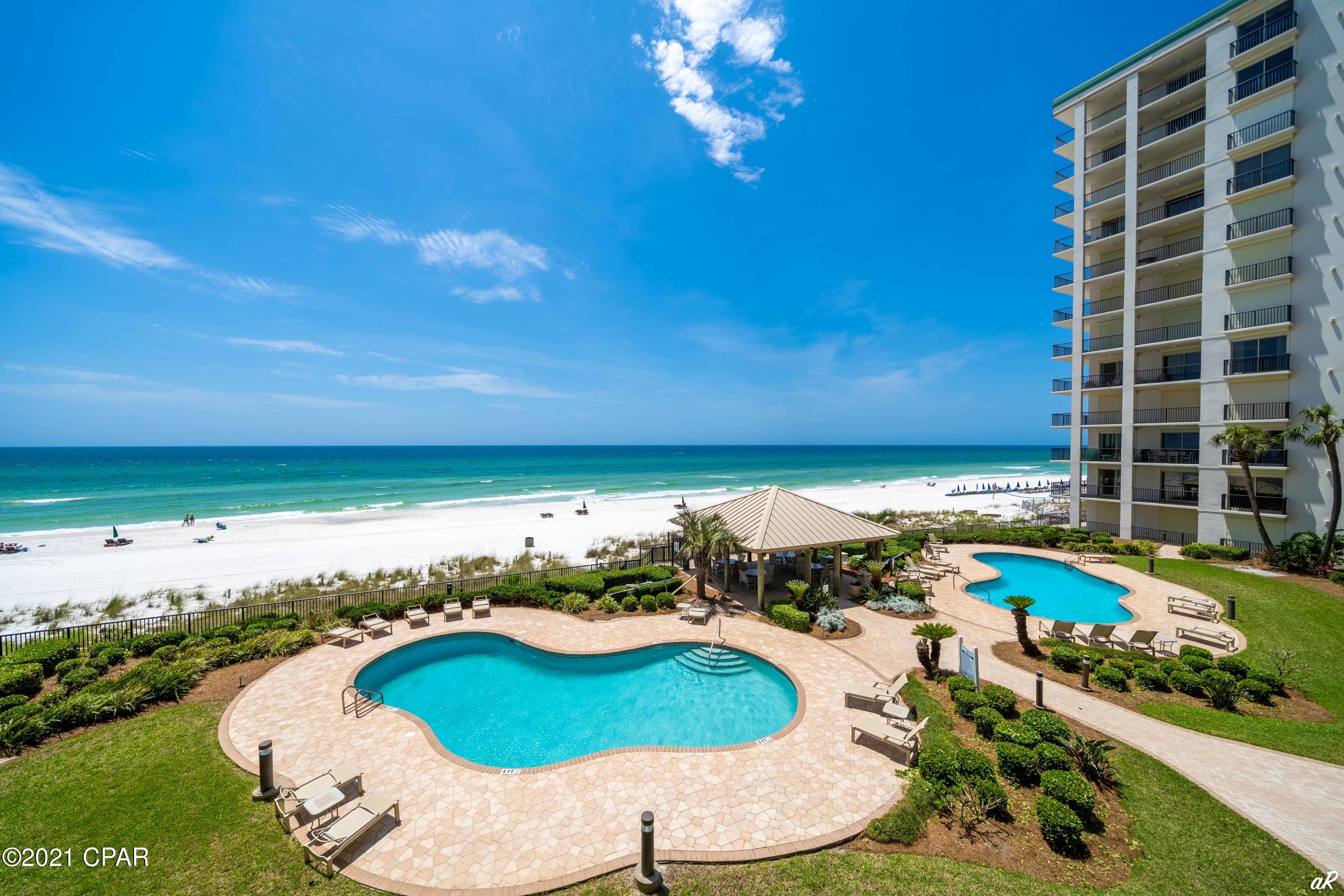 SummerWinds Condominium is a one-of-a-kind luxury gulf front condominium located on the east end of Panama City Beach. SummerWinds has 72 units in two buildings, both with 12 stories overlooking the Gulf of Mexico. This gated, private, community is a ''non-rental'' community with a variety of high-end amenities. This condominium is a three bedroom three bath floor plan with a single car garage. 9-foot ceilings, crown molding, granite countertops, spacious laundry room and large balcony. Master suite features tub and travertine shower. New carpet, tile, water heater, oven, HVAC & new washing machine.