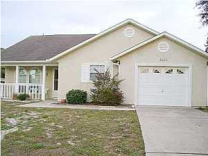 Absolutely immaculate home within walking distance to the beach! Features open floor plan, cathedral ceiling, split bedroom plan, ceramic tile throughout, breakfast bar, privacy fenced back yard, and 1-car garage.
