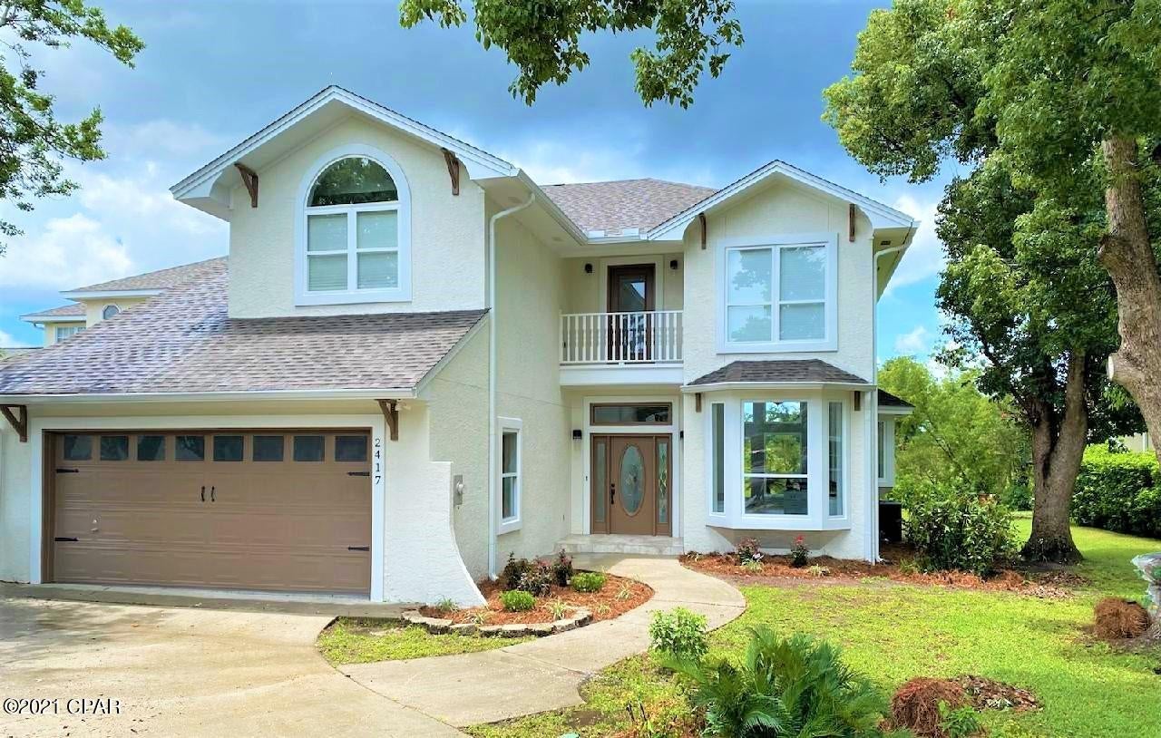Beautifully renovated and move-in ready home on the 6th hole of the Panama Country Club golf course in Lynn Haven.  This 3BR/2.5BA townhome has a new roof, luxury vinyl plank flooring, 24' ceilings, granite in kitchen and bathrooms, new GE Stainless Steel appliances, all new lighting and fixtures, extra insulation blown in as well as insulation bats on interior walls, 8' French doors to the patio, a new privacy fence, and so much more.  This home needs to be seen in person!  The Panama Country Club community is a quiet and family-friendly neighborhood with full 18-hole course and  clubhouse.  Very convenient to everything!  Homes of this caliber don't come on the market often, so you won't want to miss out! All info is approx and