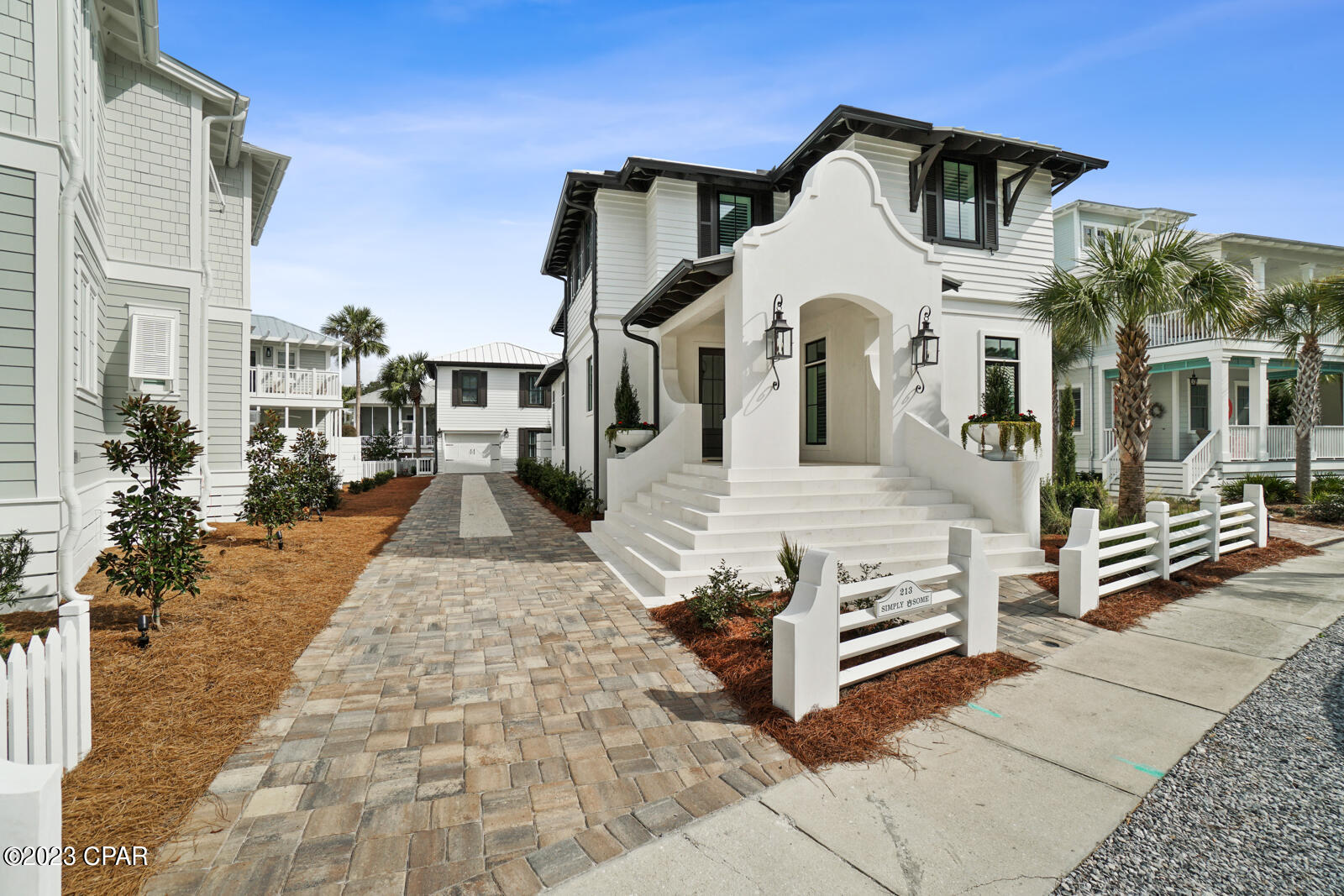 CURRENTLY UNDER CONTRACT. SELLER WILL CONSIDER BACK UP OFFERS.  The best of beach living awaits you in this stunning architectural beauty! This one is ''Shore to Please'' with its spacious interiors that flow to an amazing covered outdoor space and guest cottage. You are welcomed through a double stepped entry into the first floor level with open living, dining and gourmet kitchen boasting beautiful wood floors, beamed ceiling and fireplace. You will also find a large bedroom with ensuite bath and a powder room on the first floor level. The second level offers an additional lounge/tv area, bedroom, bunk room, bath and laundry area. Also on the second level you will find an inviting and relaxing master suite with extra large walk-in closet, luxurious spa bath with double vanity, soaking tub and separate shower. Step out onto the private master suite balcony offering the a perfect getaway spot to relax and read. There is plenty of outdoor space to gather in the oversized covered porch with summer kitchen and bar area perfect for entertaining. The separate cottage welcomes guest with their own private living/kitchen area, 2 bedrooms, 2 baths, laundry and private balcony. There is garage beneath and outdoor shower as well. You are just steps away from a private beach walk over to sugar white sand and emerald waters. This one checks all the boxes whether for a full time residence or second home, and if you are an investor looking for the perfect rental.......this one is a winner with $250K already on the books for 2023. Carillon Beach is a quite and serene gated-community with approx 3900 linear feet of sugar white sand and emerald waters. Amenities include three community pools (one beach front) tennis courts, basketball court and children's playground area, eateries and shops. You are a 5 minute bike ride from upscale shopping and restaurants in Rosemary Beach and 30 Avenue. Call today for your preview of this amazing home! (Home sold furnished with a few exceptions)