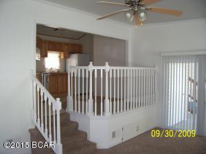 Great park model home in Emerald Point.  Emerald Point is a gated community with two pools located just across the street from the Navy Base and just a short drive to the beach.  This unit is a 2 bedroom 2 bath unit with a good sized living room and covered porch.