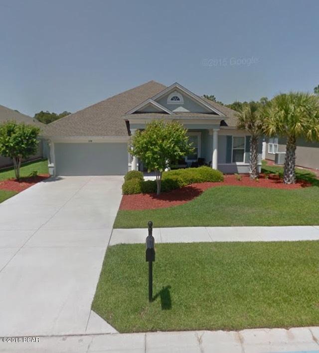 Palmetto Trace David Weekly home - very well done home with great curb appeal. This home is a three bedroom with an office that could be used as a fourth bedroom (no closet), open living area with a great kitchen and breakfast area. Also features a formal dining room with columns and hard wood floors. Master bedroom has a large walk in closet, separate shower and whirlpool tub. The community features side walks, street lamps, and community pool. Also located very close to both Pier Park and Frank Brown Sports Complex.