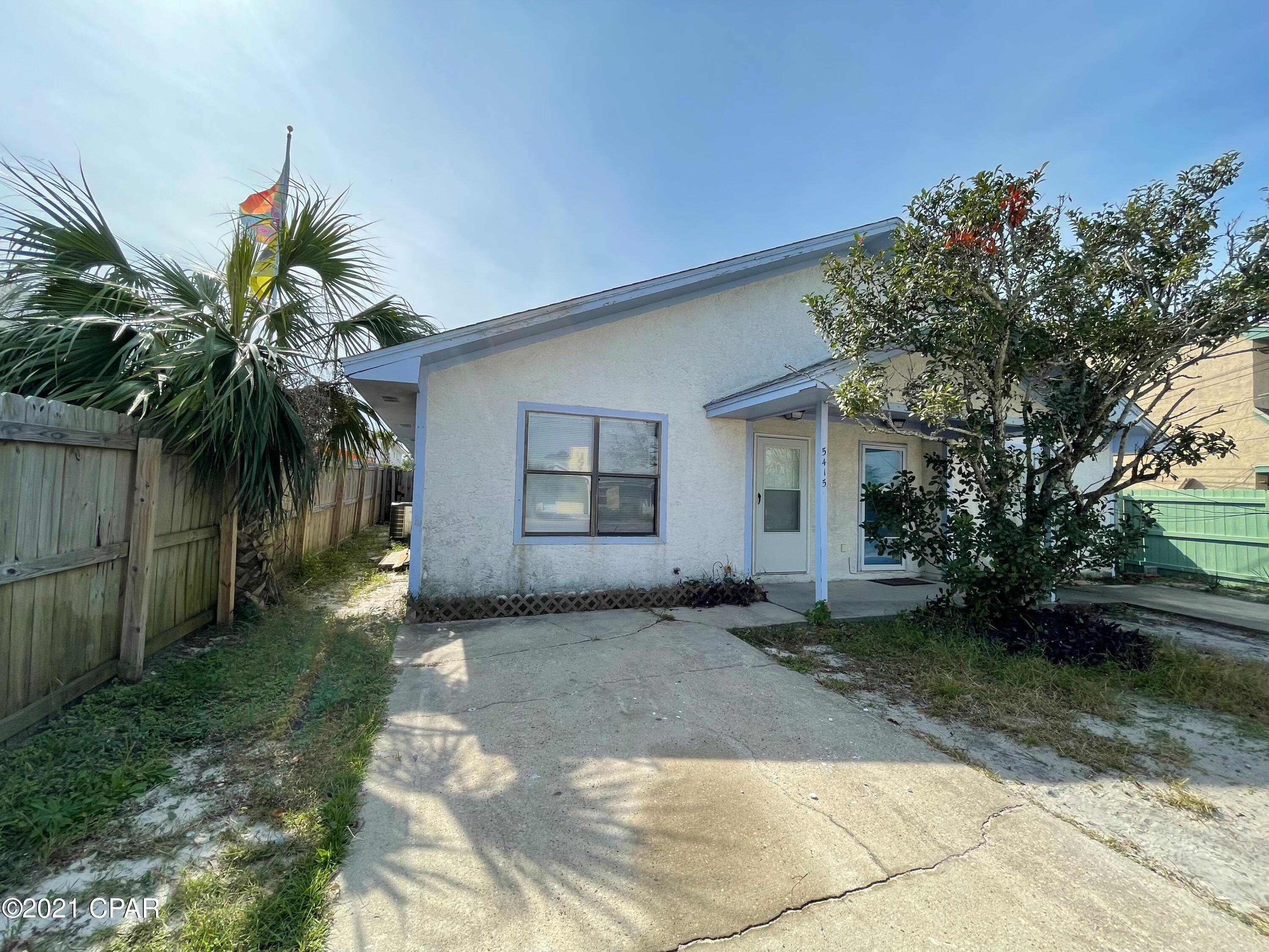 This 1 bedroom 1 bath duplex is located off Thomas Drive. Nice size living room, kitchen with breakfast bar. Bedroom has sliding door to patio and mostly privacy fenced back yard. Approximately 800 square feet of living area. Just a short walk to the beach or the fishing dock on Grand Lagoon. Pets negotiable.