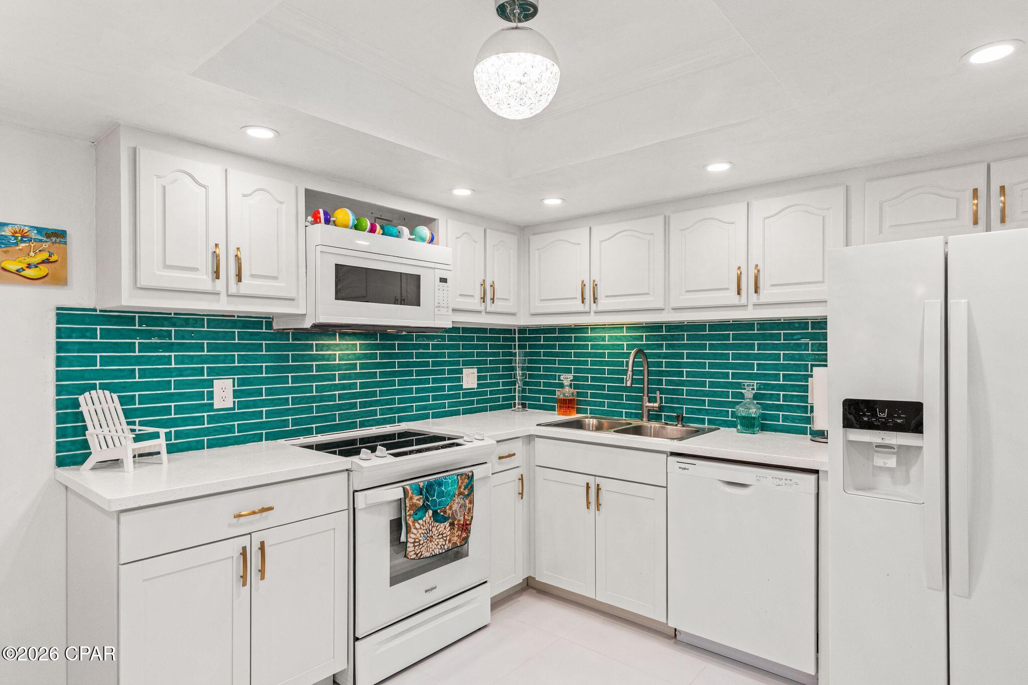 Seller will pay the current Special Assessment of $57,415 for both the Milestone Reconstruction Project and the Structural Integrity Reserve Study, in full,  when it becomes payable.  This newly remodeled two-bedroom, two-and-a-half-bathroom unit offers expansive double Gulf front views. The interior has been updated with all new appliances and tile flooring throughout. The downstairs ceilings have been smoothed, and the kitchen ceiling has been raised, featuring canned lighting and a new tile backsplash for a modern touch.
On the lower level, you can enjoy views of the Tower's indoor/outdoor pool as well as the beach and Gulf to the west, providing spectacular sunsets. The master bedroom boasts a beautiful Gulf view, which can be enjoyed from its private balcony.
The unit comes fully furnished, with a colorful and beach-inspired décor that enhances its vibrant coastal ambiance.
Pinnacle Port is a gated community with its own boat ramp and boat docks leading out to pristine Lake Powell (the State of Florida's largest coastal dune lake), bocce ball, pickle ball, shuffleboard, tennis courts, basketball court, grills on each end of the property and two pools. Pinnacle Port is a short distance to dining and shopping on 30A and at Pier Park. At Pinnacle Port, you have the best of both worlds. Conveniently located 2.4 miles (4 minute drive) from 30A, yet still 8 miles (14 minute drive) to Pier Park!