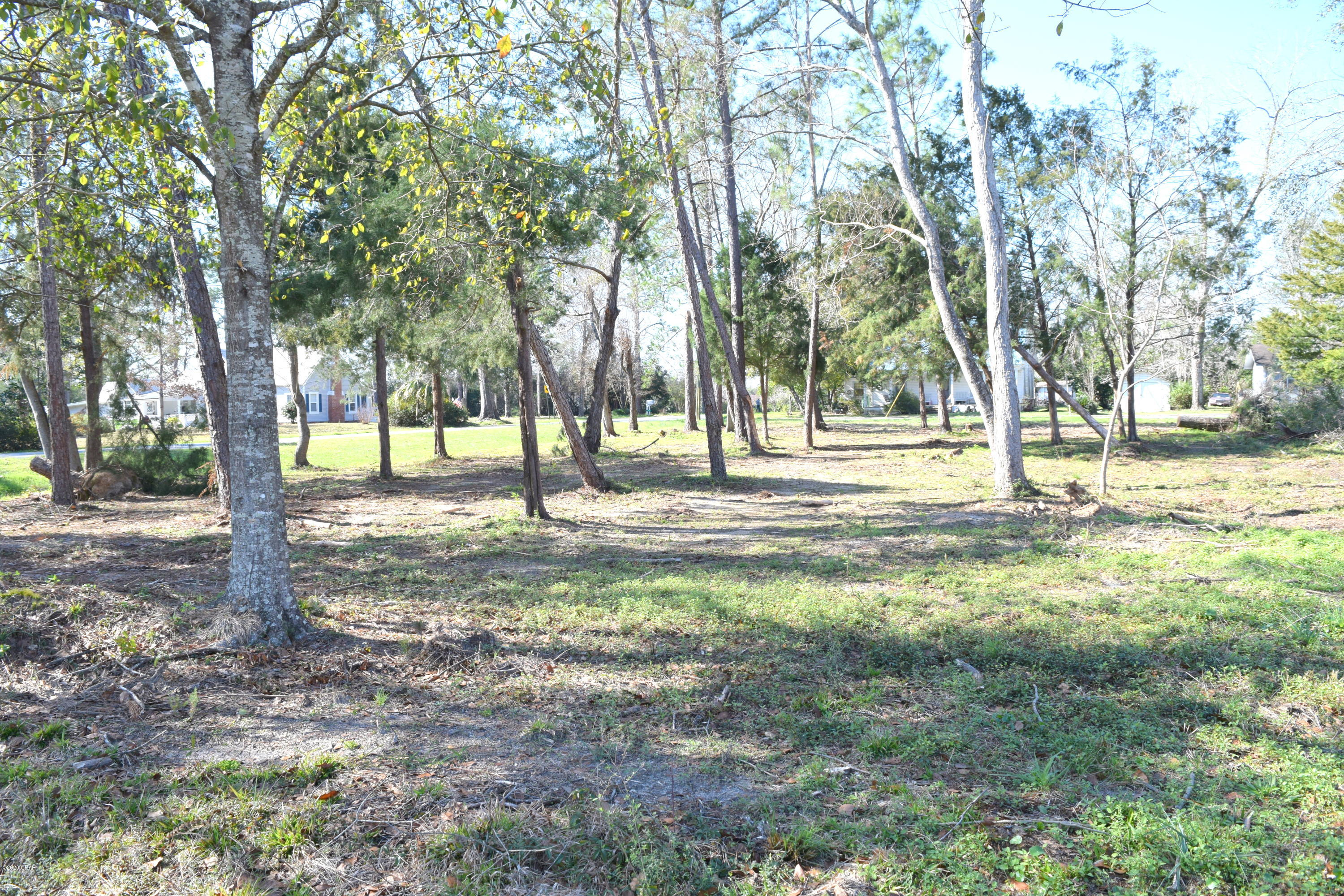 *For Comp purposes only* Located inside the city limits this corner lot stretching from Sinclair Street to 1st Street would make a great home site. Property contains several large trees and has recently had the underbrush removed.