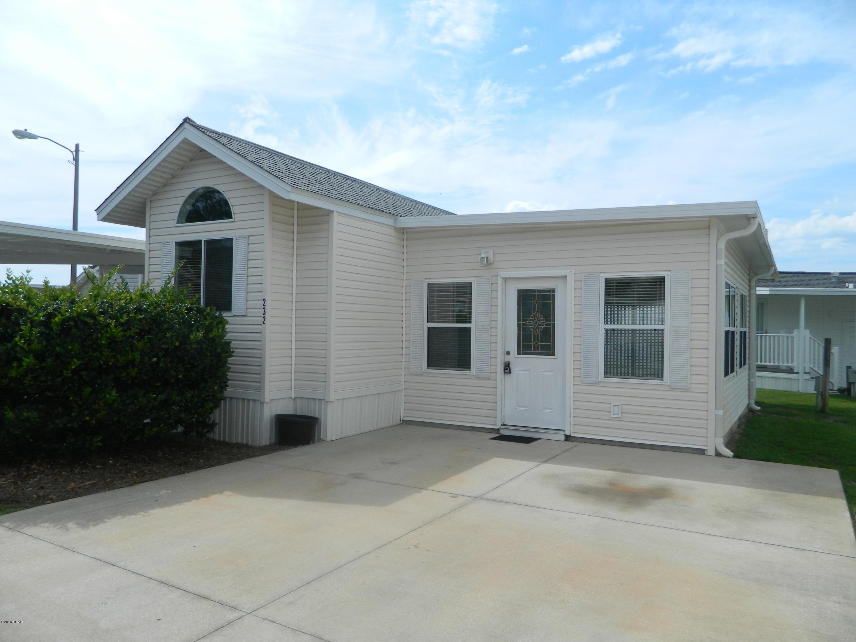 For rent. This 2 bedroom, 2 bathroom home is located in the gated community of Emerald Pointe Resort. Conveniently located on Thomas Drive and right across the street from the Navy base. The resort has two pools, exercise room, clubhouse and playground. Ready for immediate occupancy, this unfurnished home has new carpet in the large add-on living room. Washer/dryer included. Rent includes water/sewer, basic cable and garbage. **Pets under 24lb negotiable with $250 non-refundable pet fee** Please call us today for your showing!