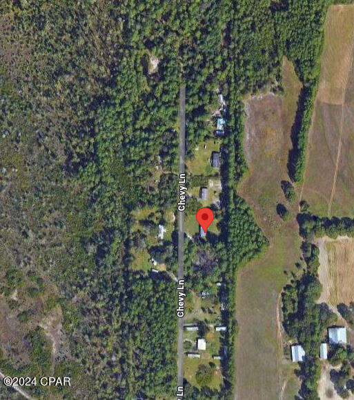 Once acre lot with well and septic close to 231 and a short trip to town.  The lot is 180 feet wide and 243 feet deep and ready to build on or bring in a manufactured home.  There was a home on the site previously and it has been all cleared off.  Buy land!!!!!  Call your Realtor today