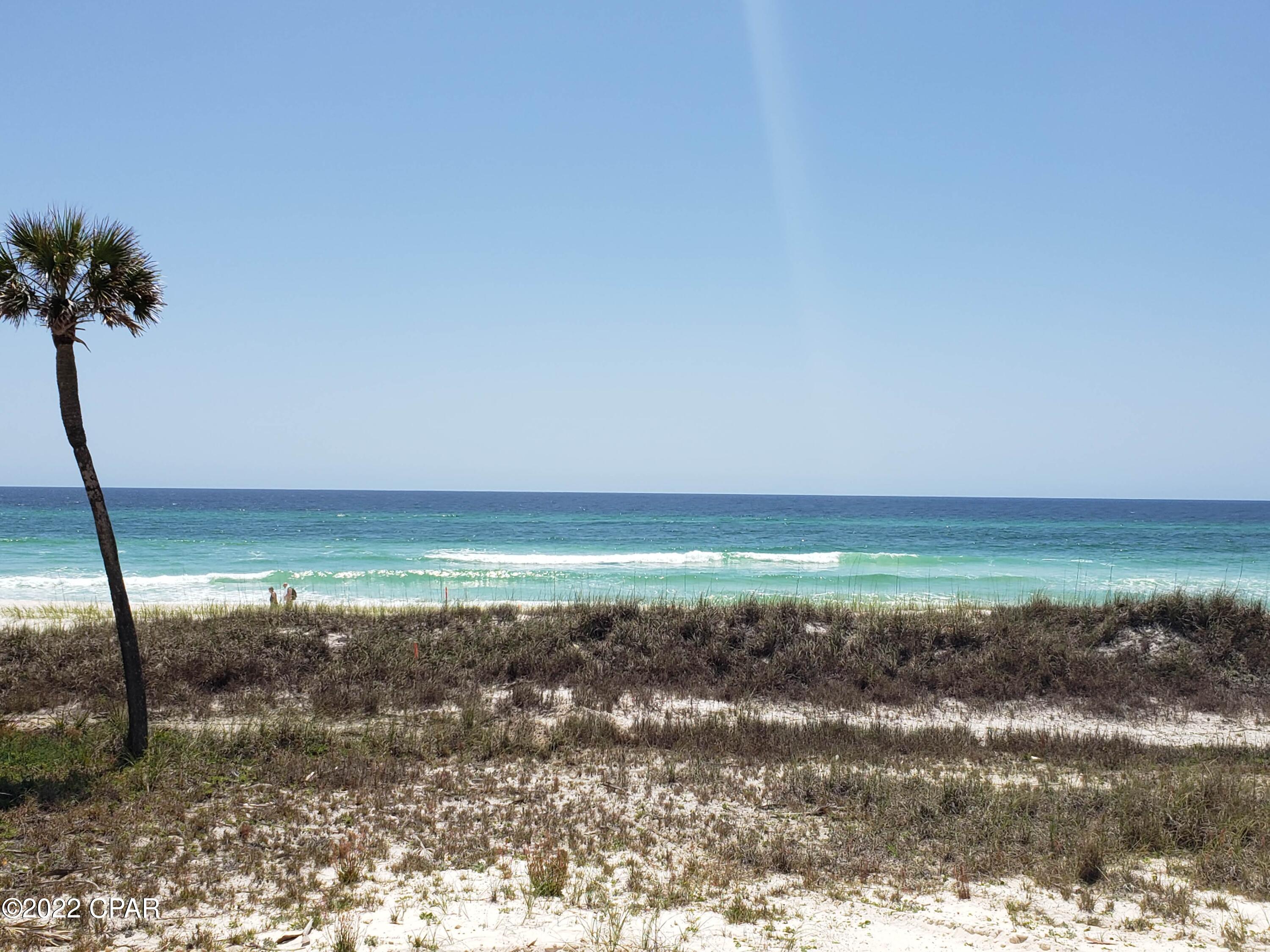 Enjoy the Margaritaville lifestyle and watch the dolphins play from all 3 levels of this new construction, 6 bedroom plus bunks, 6 ½ bath home.  



Margaritaville Beach Cottage Resort offers homeowners a chance to live the dream of owning at Margaritaville and the opportunity to share that dream with vacationers eager to book a stay here!



You'll have a hard time deciding which way to enjoy the water first!  You can relax in your private 8 x 17 pool overlooking the Gulf, enjoy the huge resort pool, take a trip around the 425 ft long lazy river or walk just a few steps down your private dune walkover to the emerald green waters of the Gulf.    



The Oasis floorplan features 3,784 sf of heated/cooled space perfectly designed to fit your every need. On the first level, you'll find a spacious recreation room featuring a wet bar and full-sized refrigerator and ice maker.  The rec room opens to the pool deck with direct beach access.  There is also a guest bedroom and full-sized bath on this level as well.  

Take your private elevator to the second level and enjoy the spacious great room with access to another balcony with endless views of white sand and Gulf waves.  You'll also find the dining area and kitchen, which features Frigidaire Professional Appliances, 36" gas range, quartz countertops and maple cabinets.  There are 2 additional guest bedrooms on this level, each with a private bath, and a laundry area and another half bath as well.  

Continuing to the third level, you'll find a primary bedroom with stunning Gulf views, a walk-in closet and access to a balcony overlooking the primary bath with double vanities and a walk-in shower.  There are two additional bedrooms and bathrooms, as well as a bunk area.  

The Oasis plan offers a two-car carport, as well as three additional spaces.  Finishes include maple cabinets, quartz countertops and luxury vinyl plank flooring throughout.  You will be able to select from one of three custom-curated Margaritaville Design Collections which provide everything from interior finishes, furniture, housewares, and more.  Once you make your pick, sit back, relax and we'll take care of the rest.  

Margaritaville Beach Cottage Resort will feature an on-site restaurant and poolside bar, pickleball court, game lawn, hammock grove and movies by the pool for you and your guests.  This resort will be a premier destination and will offer you and your vacation rental guests a unique opportunity to enjoy luxury resort amenities with all the comforts of a beach front single family residence.     

A 15% minimum deposit is due after signing and the remainder due at closing.  We are using a builder contract which will be provided for your review along with all association and club documents.