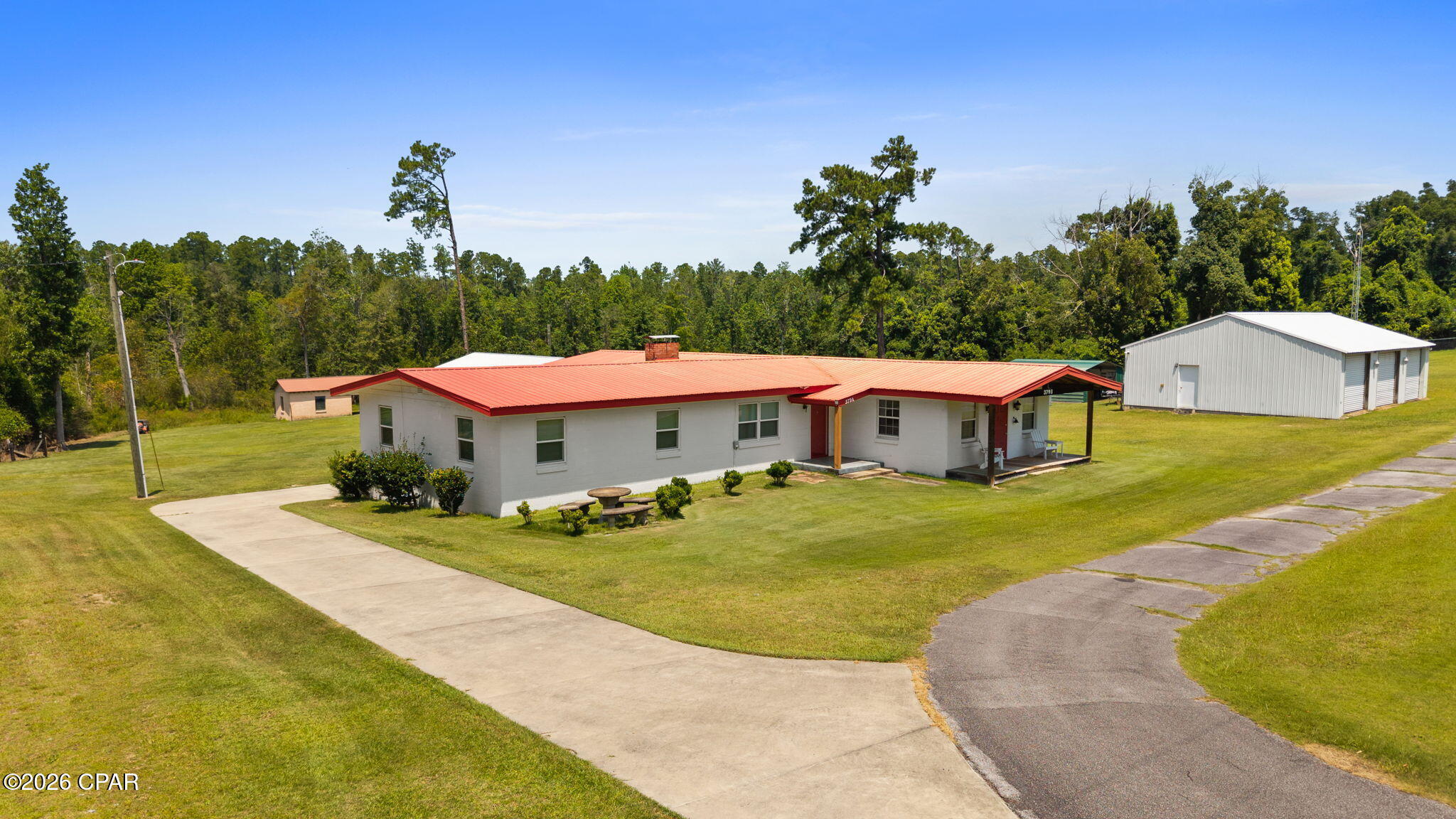Move-In Ready 5/3 on 1.46 Acres Across from
650-Acre Compass Lake.  Escape to peaceful Florida living just minutes from the water. This spacious 5-bedroom, 3-bath home sits on a generous 1.46 acre lot directly across the street from the 650-acre Compass Lake. Perfect for a large family, multi-generational living, or a strong rental/AirBnB investment.
Property Highlights
• 5 bedrooms | 3 bathrooms | Move-in ready
.  560 sq.ft. bonus space in the unfinished walk-out basement ready for your personal touch.
.  20x40 workshop equipped with a convenient roll-up door and also includes an additional 16x20 storage building on the property
• Flowing creek at the rear of the property, stocked with fish and fed year-round by an artesian well
• Walking distance to the public boat ramp
• Approximately 10 minutes south of I-10
• Only 40 minutes to 23rd Street in Panama City
Enjoy the quiet of country living with easy access to lake recreation, boating, and fishing right in your backyard. Whether you're looking for room to spread out with family or a turnkey income-producing property, this one checks every box.
Serious inquiries welcome. Schedule your showing today.