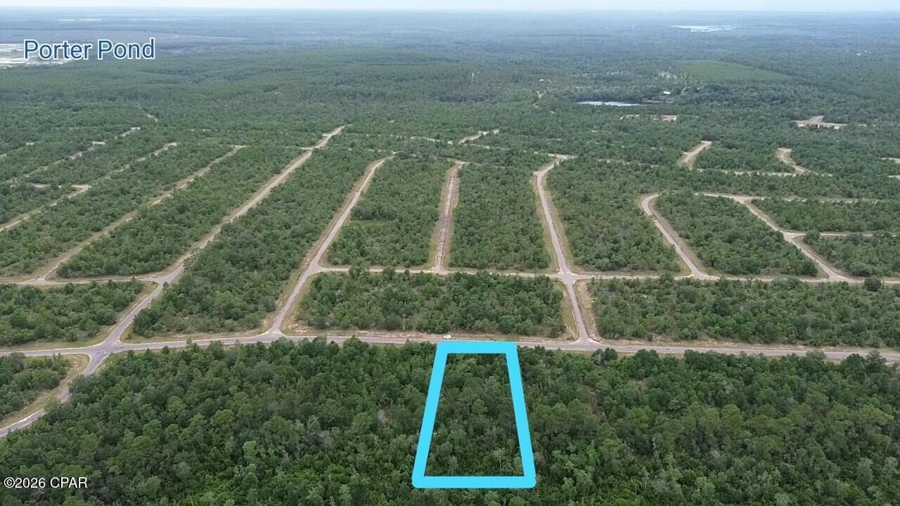 Discover the perfect canvas for your Florida lifestyle on this spacious 0.36-acre parcel in the desirable Sunny Hills community in Chipley, FL. Nestled in a peaceful, growing subdivision, this level lot offers ample space to design and construct your ideal single-family home, with room for outdoor living, gardening, or future expansions.

Sunny Hills is a golfer's and nature lover's paradise, featuring an acclaimed 18-hole golf course at Sunny Hills Golf Club with wide fairways and large greens that provide enjoyable play for all skill levels. Residents enjoy access to a scenic boat lake, a swim park, multiple additional lakes ideal for fishing or swimming, and community parks for relaxation and recreation.

The community is experiencing exciting growth, with multiple reputable builders actively constructing new homes, bringing fresh energy and modern residences to the area. Convenience is at your doorstep with a Dollar General market right at the entrance of one of the main boulevards, making everyday errands effortless.

Location is unbeatable: This property is just minutes away from Porter Pond known for its excellent fishing and boating and just 30 minutes from the charming city of Chipley for shopping, dining, and services, and under an hour's drive to the stunning white sands and emerald waters of Panama City Beach perfect for weekend getaways or day trips to the Gulf Coast.

Whether you're seeking a peaceful retreat surrounded by natural beauty or a vibrant community with endless outdoor amenities, this lot in Sunny Hills offers the ideal blend of tranquility, recreation, and convenience. Don't miss your opportunity to secure a piece of Florida Panhandle paradise.