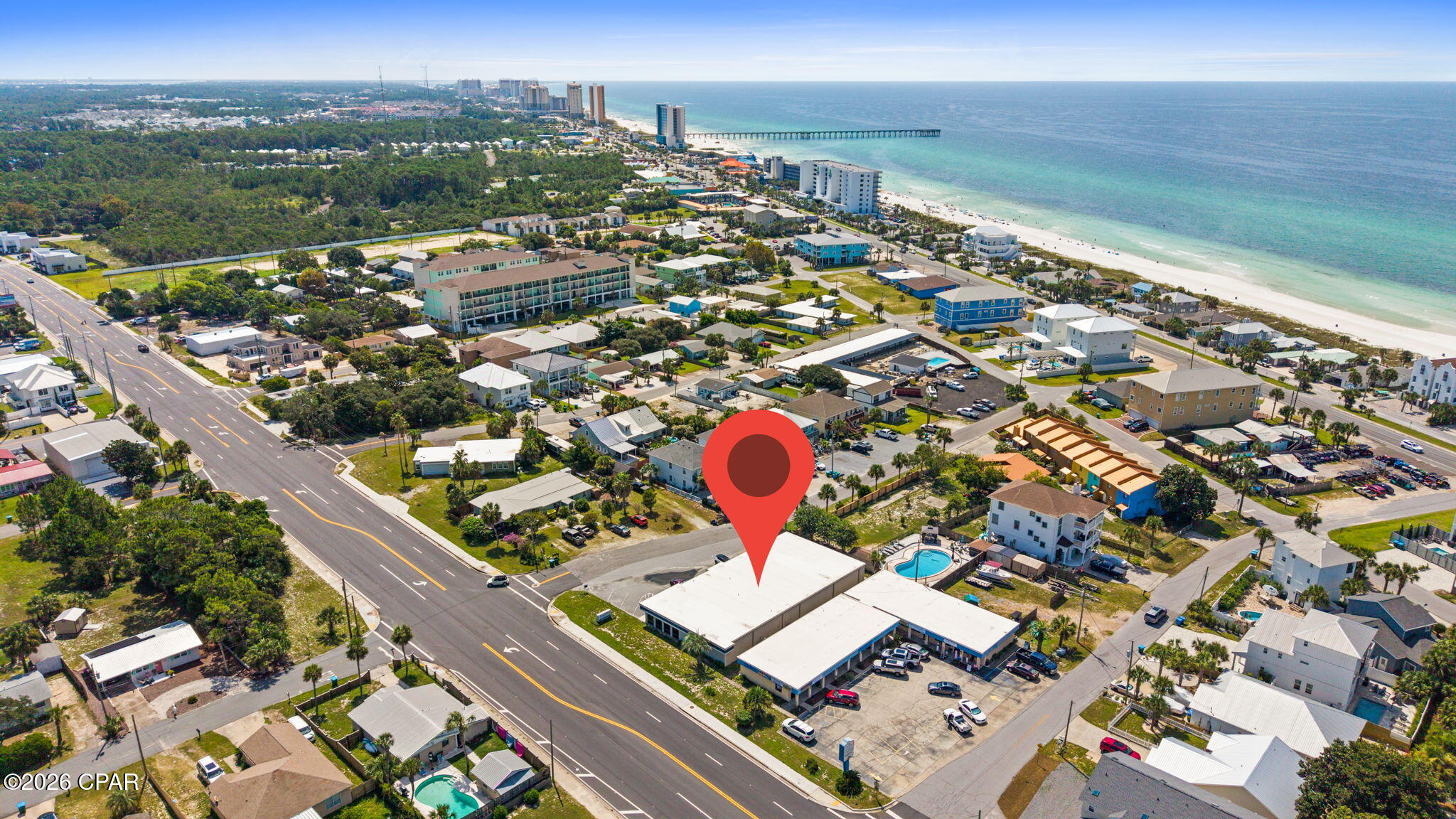 Retail opportunity in the heart of Panama City Beach!  The interior was remodeled in 2017 and features two offices, a breakroom and restrooms ensuring a functional layout for operations.  A new roof was installed in 2019,  AC units were replaced in 2025 and the outside of the building was painted in 2020.  This property is situated on a high visible corner lot at Hutchinson Blvd and Dogwood St. just off Front Beach Road.  Whether you are expanding your business or investing in prime commercial real estate look no further.
