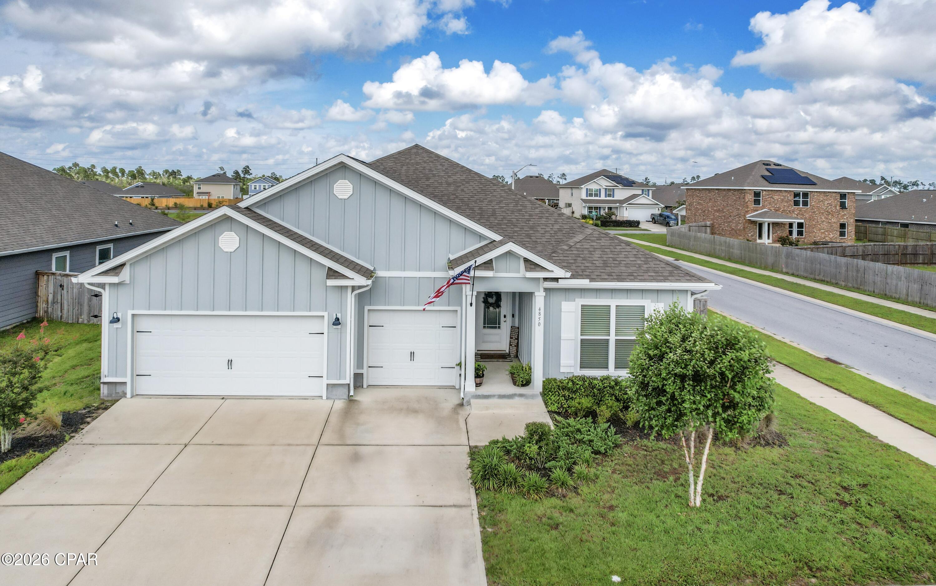 WOW! **SELLER OFFERING HUGE INCENTIVES!** Up to 3.3% (of purchase price) seller credit toward buyer closing costs, rate buy down etc., a 2-year home warranty, and 1 year of HOA dues paid with an acceptable offer! This is an exceptional opportunity for buyers!
Welcome to this beautiful 4-bedroom 4-bath home in the highly sought-after Titus Park community, offering a community pool and dog run within walking distance. With 2,817 sqft of thoughtfully designed living space and situated on a corner lot, this spacious residence combines timeless curb appeal with an attractive Hardie board siding construction.
Step inside to an inviting foyer that immediately showcases the home's open, modern layout. To the right, two bedrooms share a well-appointed Jack-and-Jill bathroom. As you continue through the home, you'll find a conveniently located half bath, an oversized laundry room, and access to the spacious three-car garage.
Adjacent to the foyer is an expansive second living area that can easily serve as a family room, media room, home office, or fitness space. This area also provides access to a private fourth bedroom featuring its own en-suite bathroom and walk-in closet, making it an ideal guest/mother-in-law suite.
The main living areas feature elegant tray ceilings with crown molding, recessed lighting, and abundant natural light. 
The kitchen is truly the heart of the home and designed with functionality in mind. It offers abundant cabinetry, a large granite-topped center island with additional storage on the back side, a coffee bar, oversized walk-in corner pantry, and stainless appliances-including the refrigerator. Just off the kitchen, the breakfast area overlooks the private backyard, creating the perfect setting for casual dining.
The spacious owner's suite provides a peaceful retreat overlooking the backyard and features a luxurious en-suite bath with soaking tub, walk-in shower, dual granite vanities, private water closet, generous walk-in closet, and additional linen storage.
Step outside to enjoy the fully fenced backyard, complete with an expansive covered patio ideal for entertaining and plenty of room to relax. Additional exterior upgrades include a full irrigation system, wrap around gutters, and a Culligan whole-home water softener system, adding both convenience and value. The oversized 30' x 20' three-car garage offers exceptional space for vehicles, storage, hobbies, or a home gym.
Conveniently located just minutes from the growing Lindsey Crossing development with restaurants, shopping, grocery stores, and Starbucks, this home is also approximately 25 minutes to Tyndall Air Force Base and Naval Support Activity Panama City, making it an outstanding location for military personnel and commuters alike.
Outdoor enthusiasts will appreciate being only five minutes from Lynn Haven's beautiful Bayou Park & Preserve, a 99-acre destination featuring walking trails, fitness loops, playgrounds, docks, boardwalks, open pavilions, and abundant green space.
If you've been searching for a move-in ready home, this incredibly popular Camden open floor plan has it all - the spacious living areas, a private guest suite, three-car garage, and an unbeatable location.
All measurements are approximate; buyer to verify if important. Schedule your private showing today!
