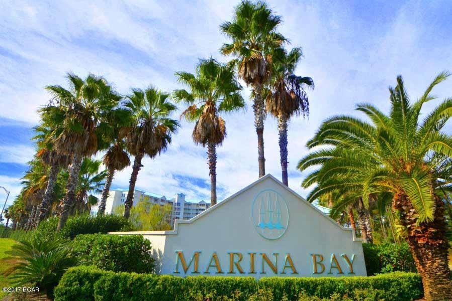 A LIKE NEW 2 BEDROOM CONDO UNIT AT MARINA BAY. LOCATED ON THE MOST DESIRABLE NORTH WING OF THE 6TH FLOOR WITH BREATHTAKING FRONTAL VIEWS OF NORTH BAY FROM THE LIVING ROOM, DINING ROOM, KITCHEN, AND MASTER BEDROOM. KITCHEN FEATURES BLACK GRANITE COUNTERTOPS WITH  MIRRORED BACKSPLACH ALONG WITH STAINLESS APPLIANCES. THE REFRIGERATOR IS A SIDE BY SIDE STYLE WITH ICE AND WATER DISPENSER. THE STOVE/OVEN IS A CERAMIC COOKTOP.  MASTER BATH FEATURES A SPACIOUS SEPARATE SHOWER ALONG WITH A JACCUZI TUB AND TWO VANITIES. WALK-IN CLOSETS IN BOTH BEDROOMS. AN OUTSTANDING FLOORPLAN.  A VERY LARGE LAUNDRY ROOM HAS NUMEROUS CABINETS WITH SPACIOUS COUNTER TOPS. WASHER AND DRYER ALSO CONVEY. ALL WINDOWS HAVE PULL DOWN SHADES WITH CUSTOM VALANCES.  ALSO THE SLIDER DOORS AND BEDROOM HAVE HIDEAWAY SCREENS. THE FLOORING CONSISTS OF WOOD GRAIN LOOK CERAMIC TILE IN THE LIVING ROOM AND DINING AREA; CERAMIC TILE IN FOYER, KITCHEN, AND BATHS; AND CARPET IN THE BEDROOMS.  COMES WITH ONE COVERED PARKING SPACE (#19) IN THE NORTH WING WITH NUMEROUS OUTSIDE PARKING SPACES AVAILABLE. COMMUNITY FEATURES INCLUDE A BEACH, PIER, POOL, HOT TUB, COMMUNITY & EXERCISE ROOMS, AND MARINA.  MARINA BAY IS A FAMILY ORIENTED COMPLEX.  SHORT TERM RENTALS ARE NOT ALLOWED.  THE VIEWS OF NORTH BAY AND SUNSETS ARE BREATHTAKING.  IN ADDITION, THE NORTH WING OF MARINA BAY HAS MINIMAL TRAFFIC NOISE FROM BAILEY BRIDGE.  PATIO IS QUIET AND ENJOYABLE.  AS MENTIONED EARLIER CONDO UNIT IS IN LIKE NEW CONDITION.  SELLER IS ORIGINAL OWNER.